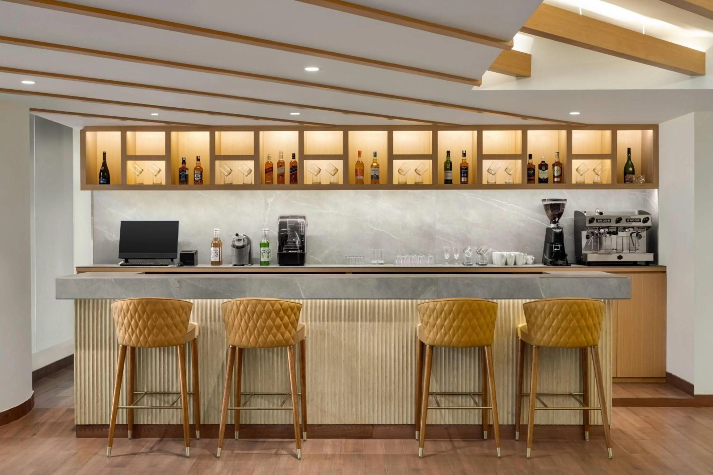 Lounge or bar in Ramada Encore by Wyndham Lucknow Airport
