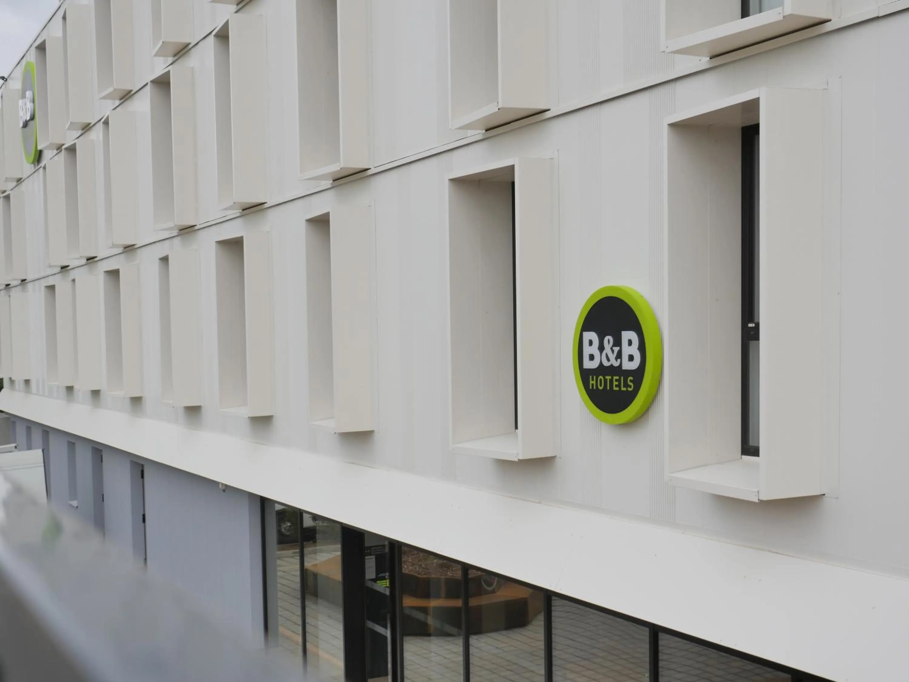 Property logo or sign in B&B HOTEL Carcassonne Rocadest La Cité