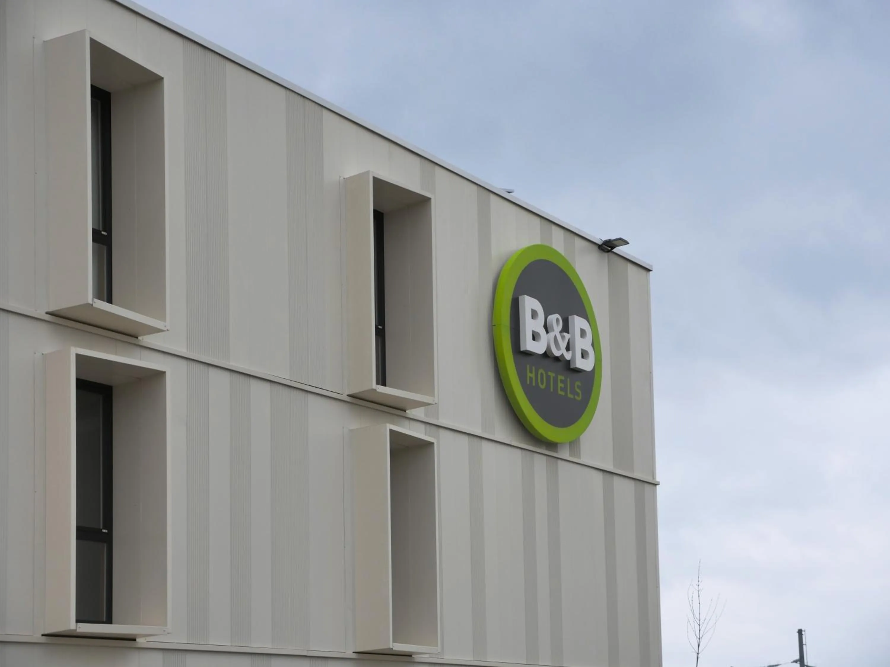 Property logo or sign in B&B HOTEL Carcassonne Rocadest La Cité