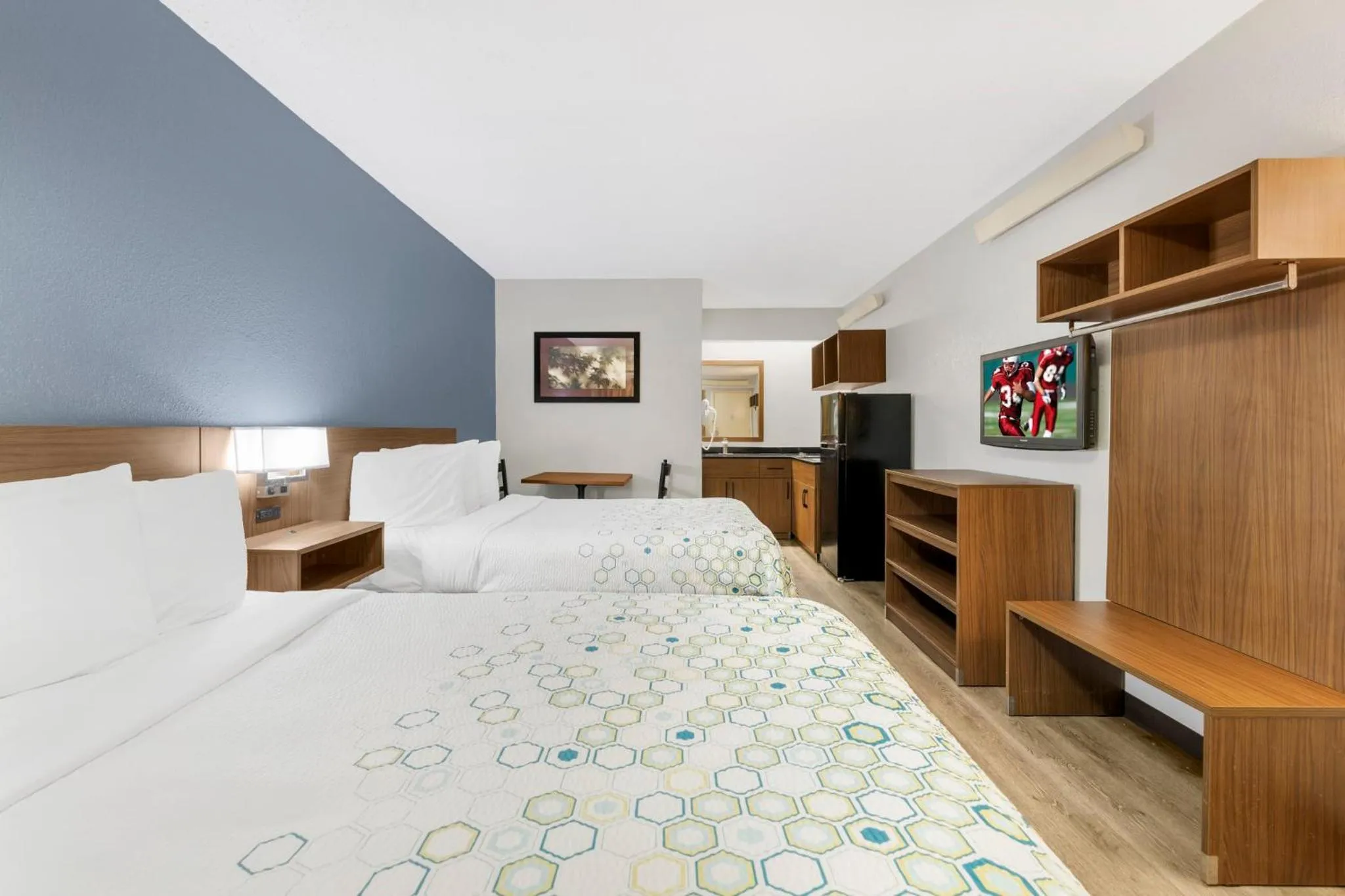 Photo of the whole room, Bed in HomeTowne Studios by Red Roof Buffalo - Niagara Airport