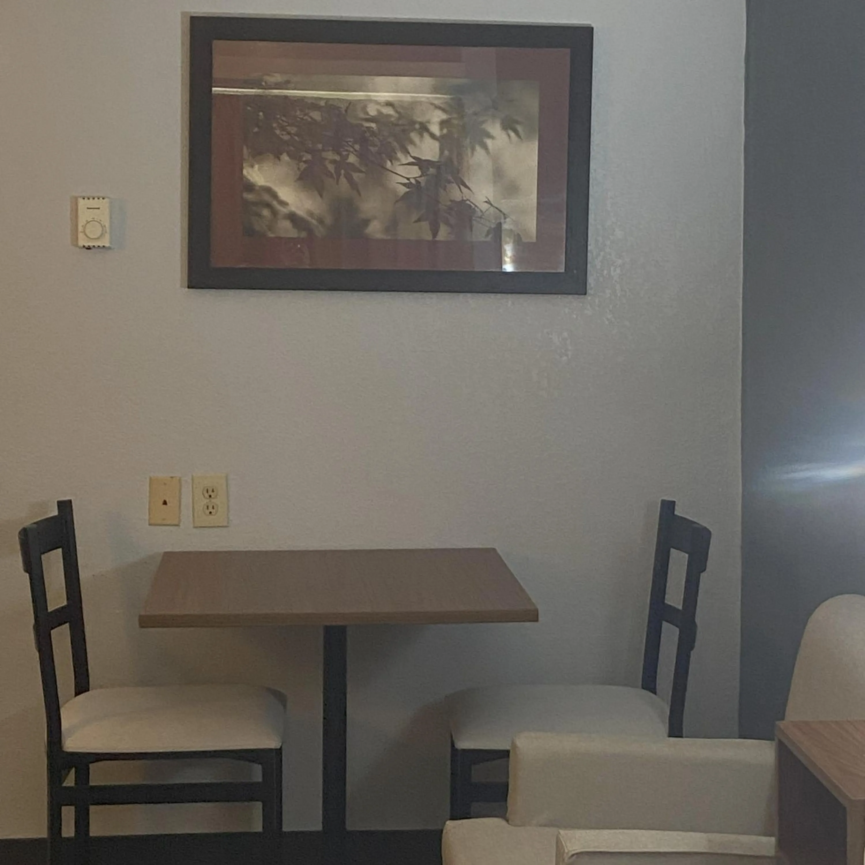 Dining area in HomeTowne Studios by Red Roof Buffalo - Niagara Airport