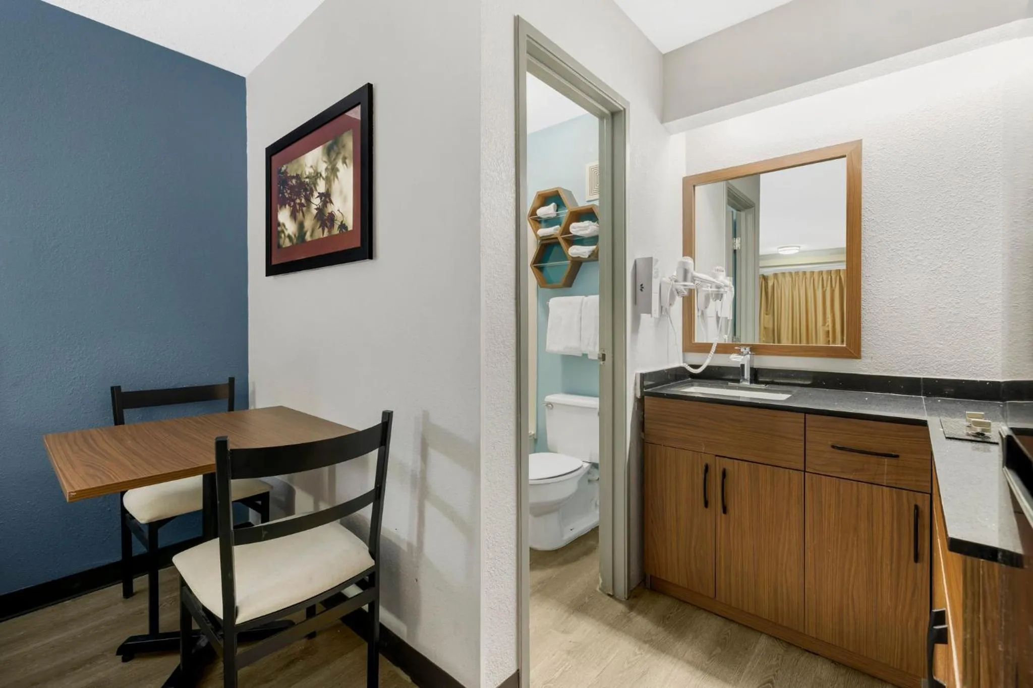 Photo of the whole room in HomeTowne Studios by Red Roof Buffalo - Niagara Airport