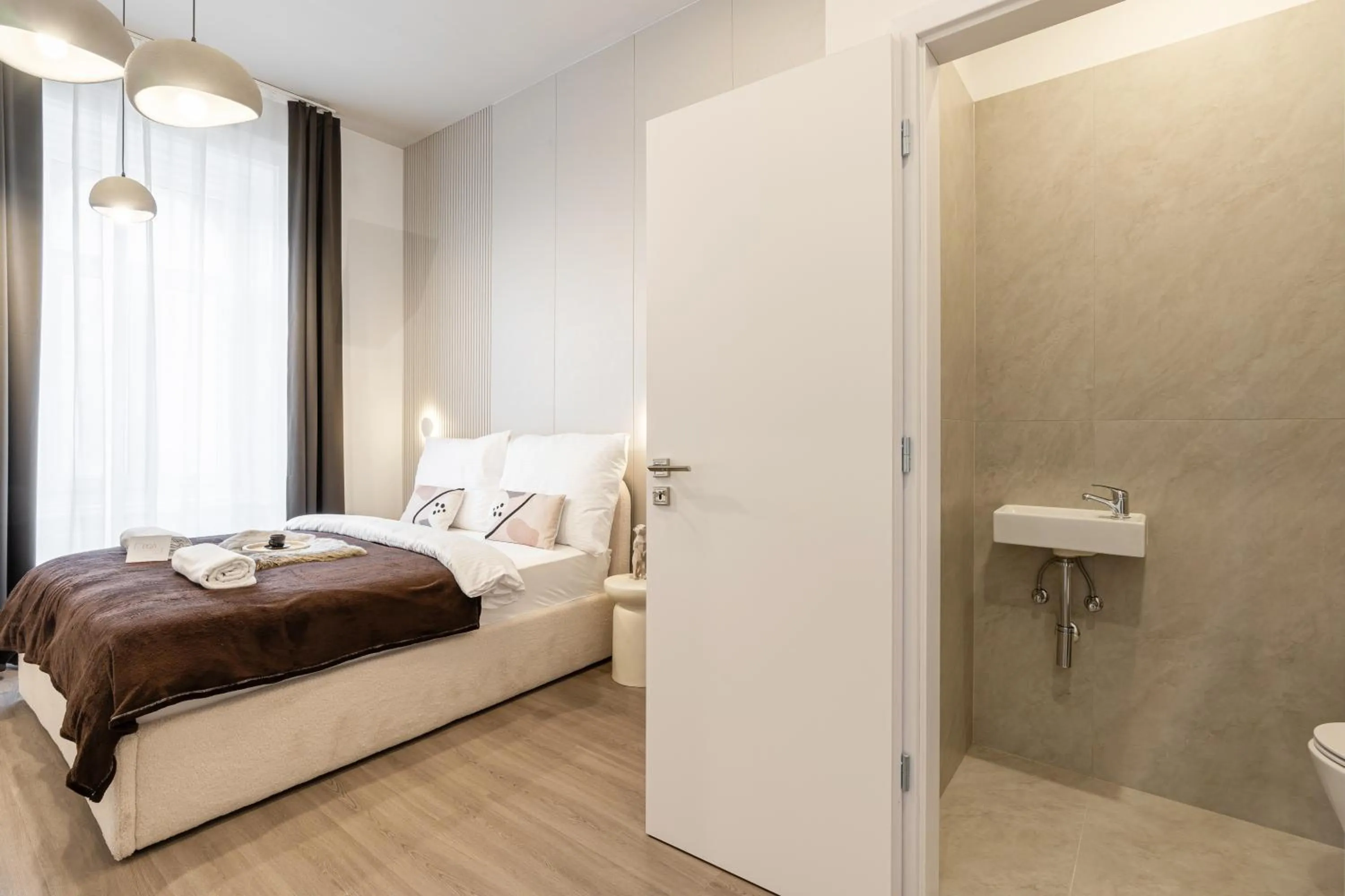 Bed in Oasis Luxe Boutique Suites by BQA