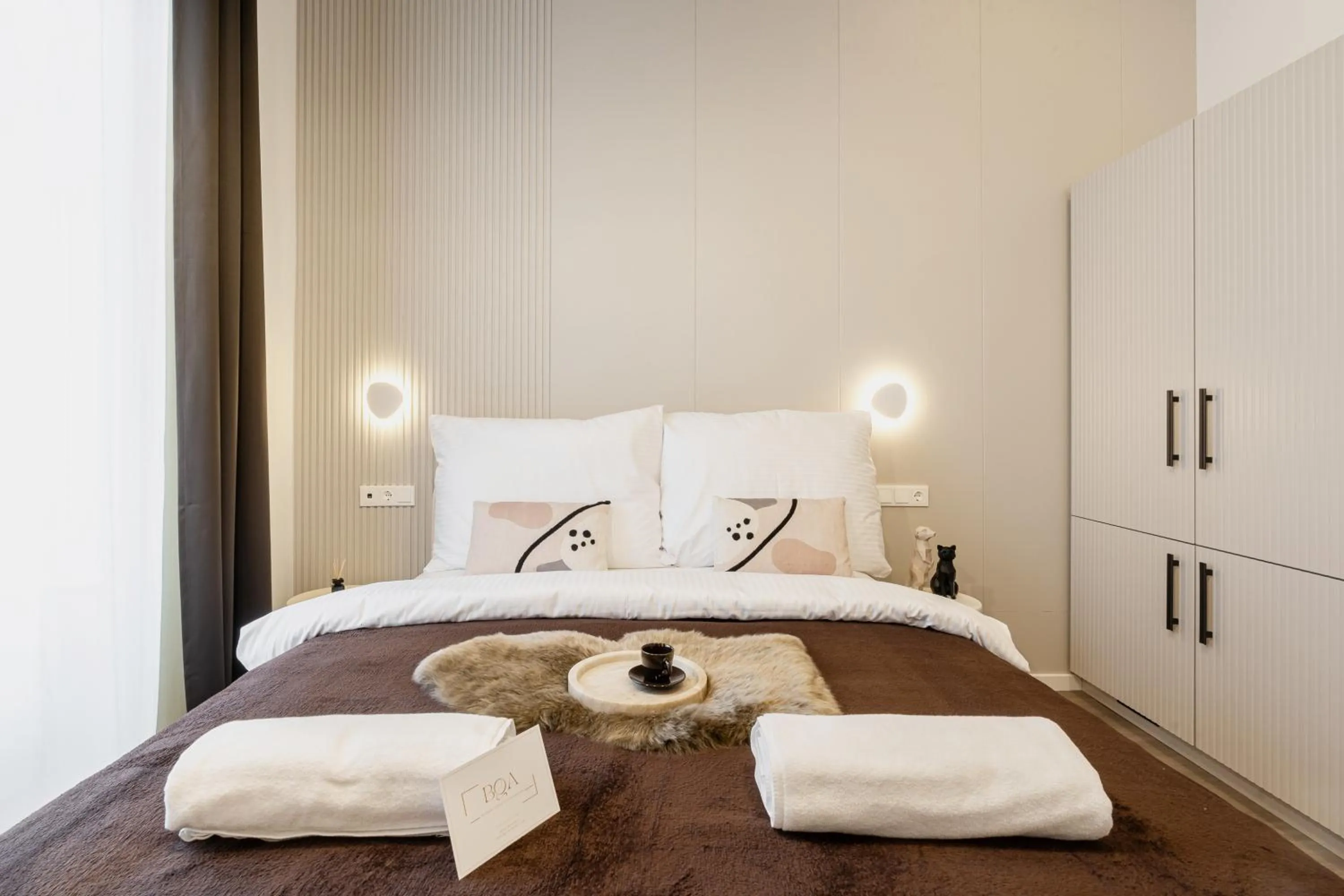 Bed in Oasis Luxe Boutique Suites by BQA