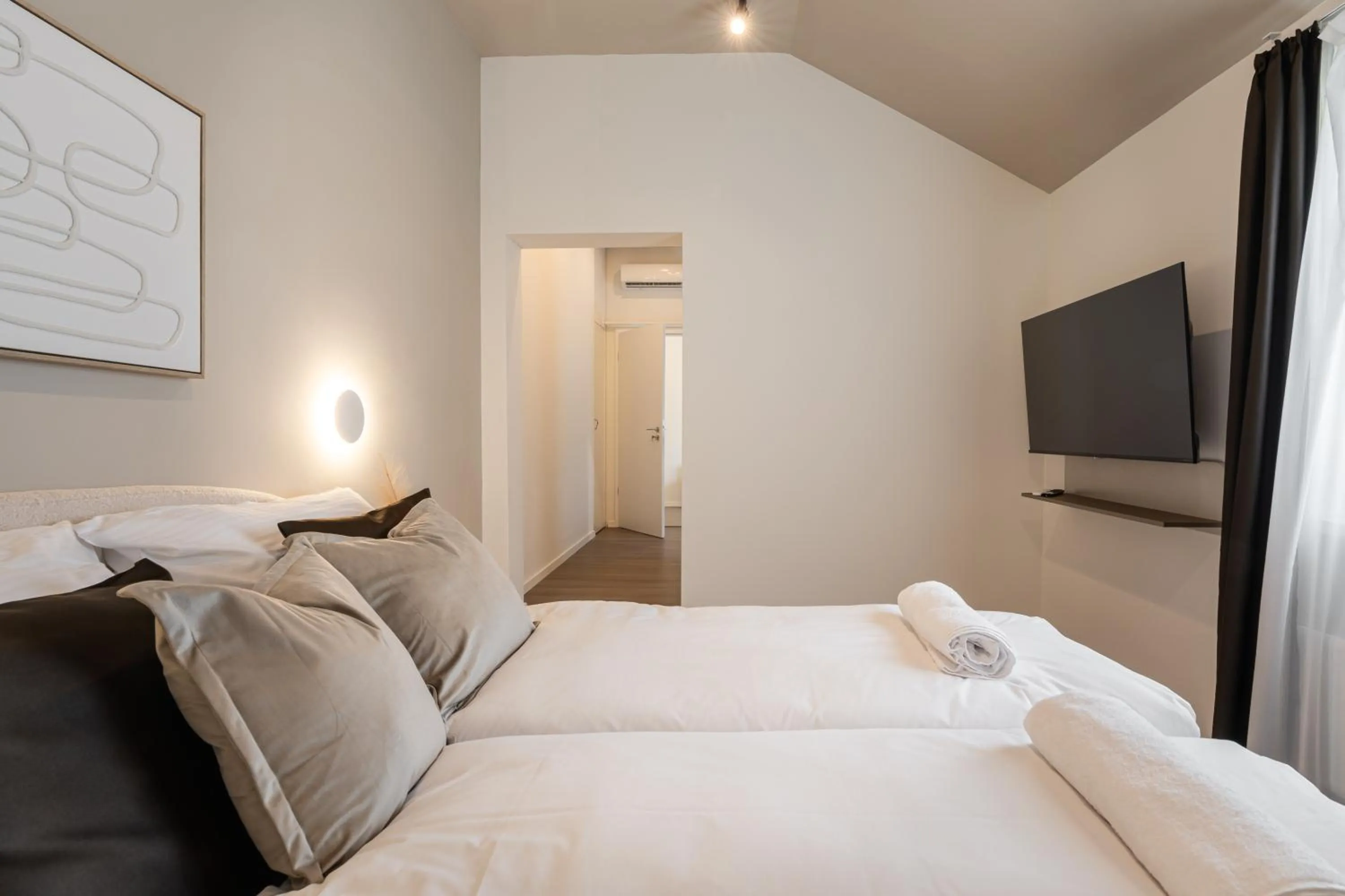 Bed in Oasis Luxe Boutique Suites by BQA