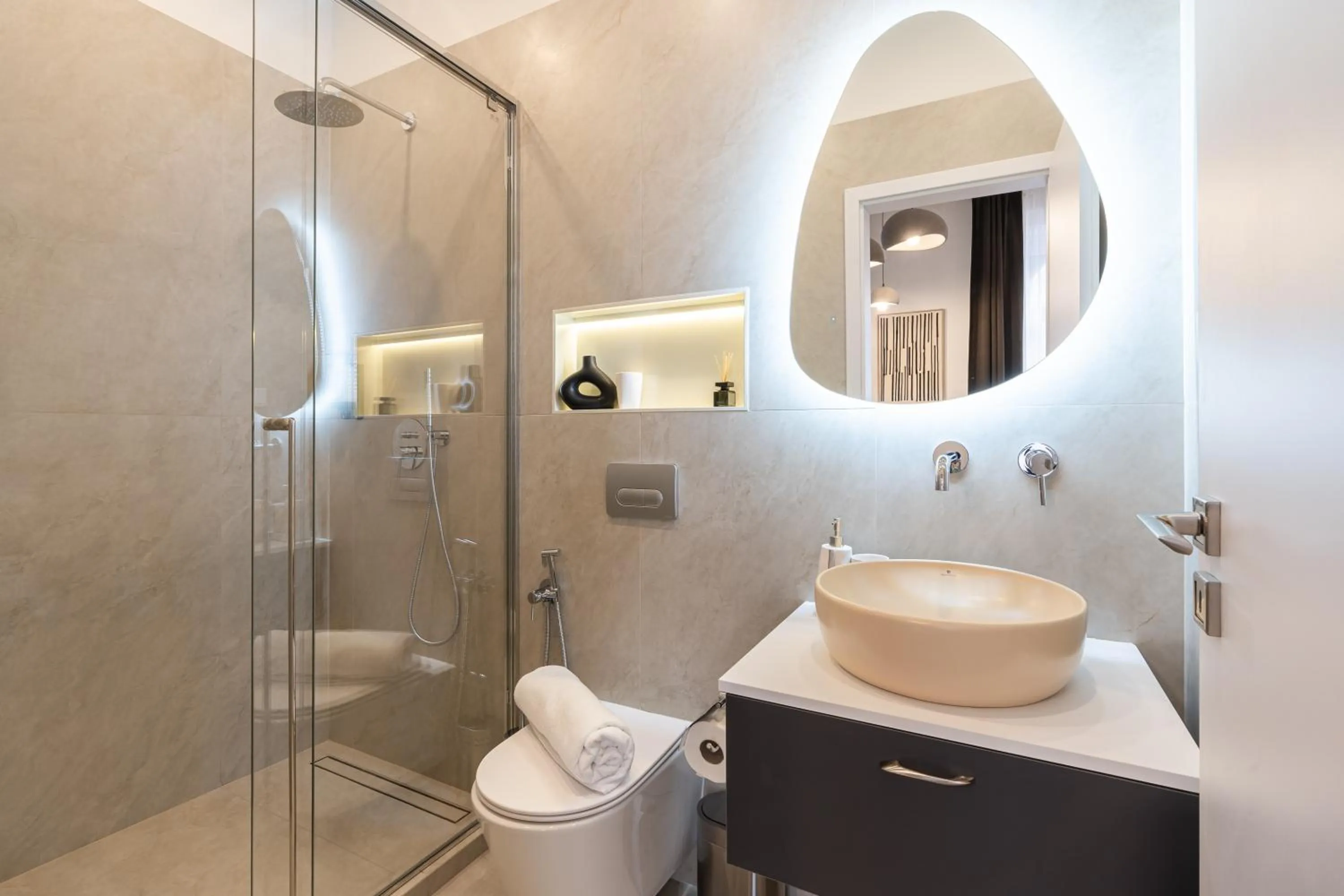 Shower in Oasis Luxe Boutique Suites by BQA