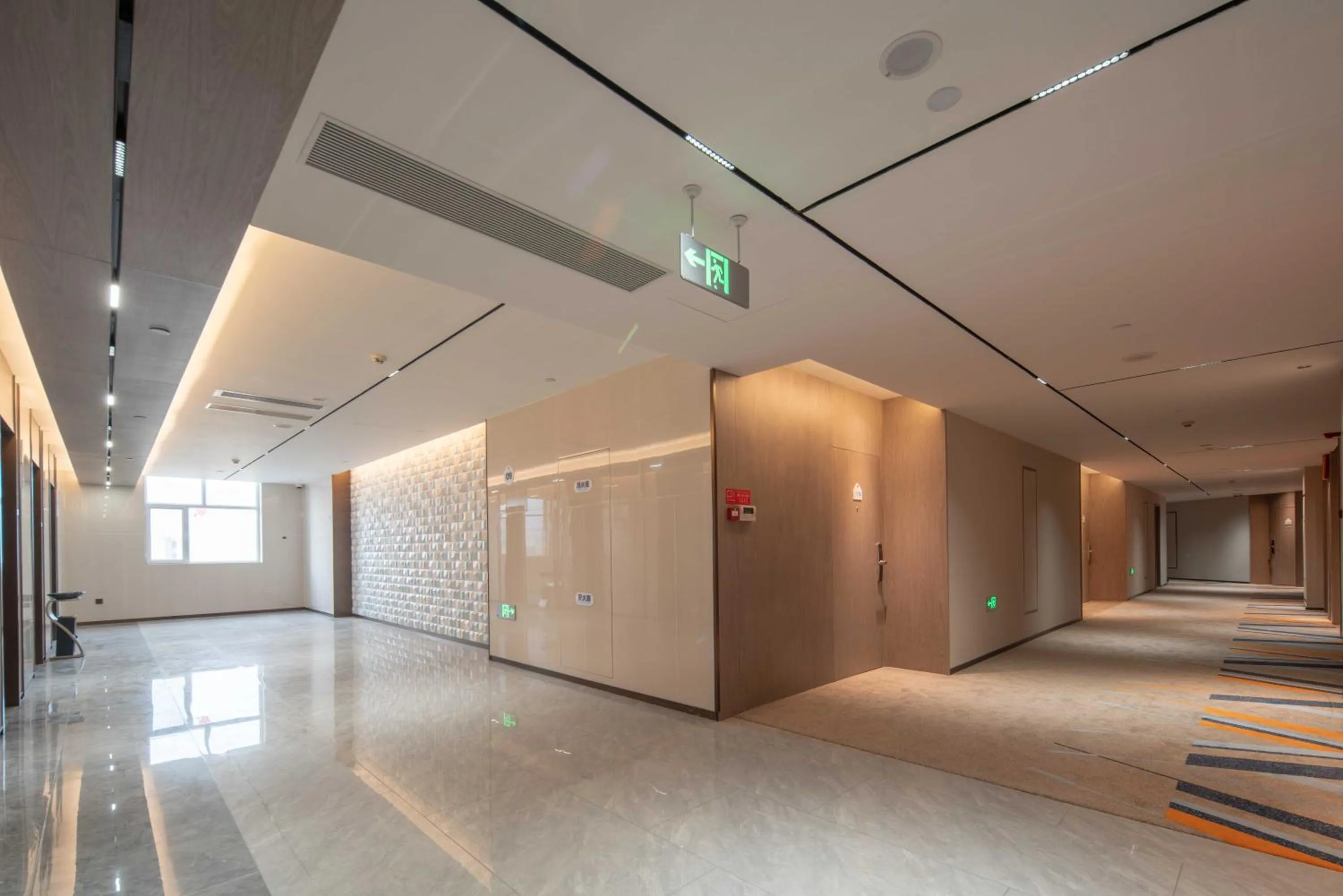 elevator, Bed in Holiday Inn Express Turpan, an IHG Hotel