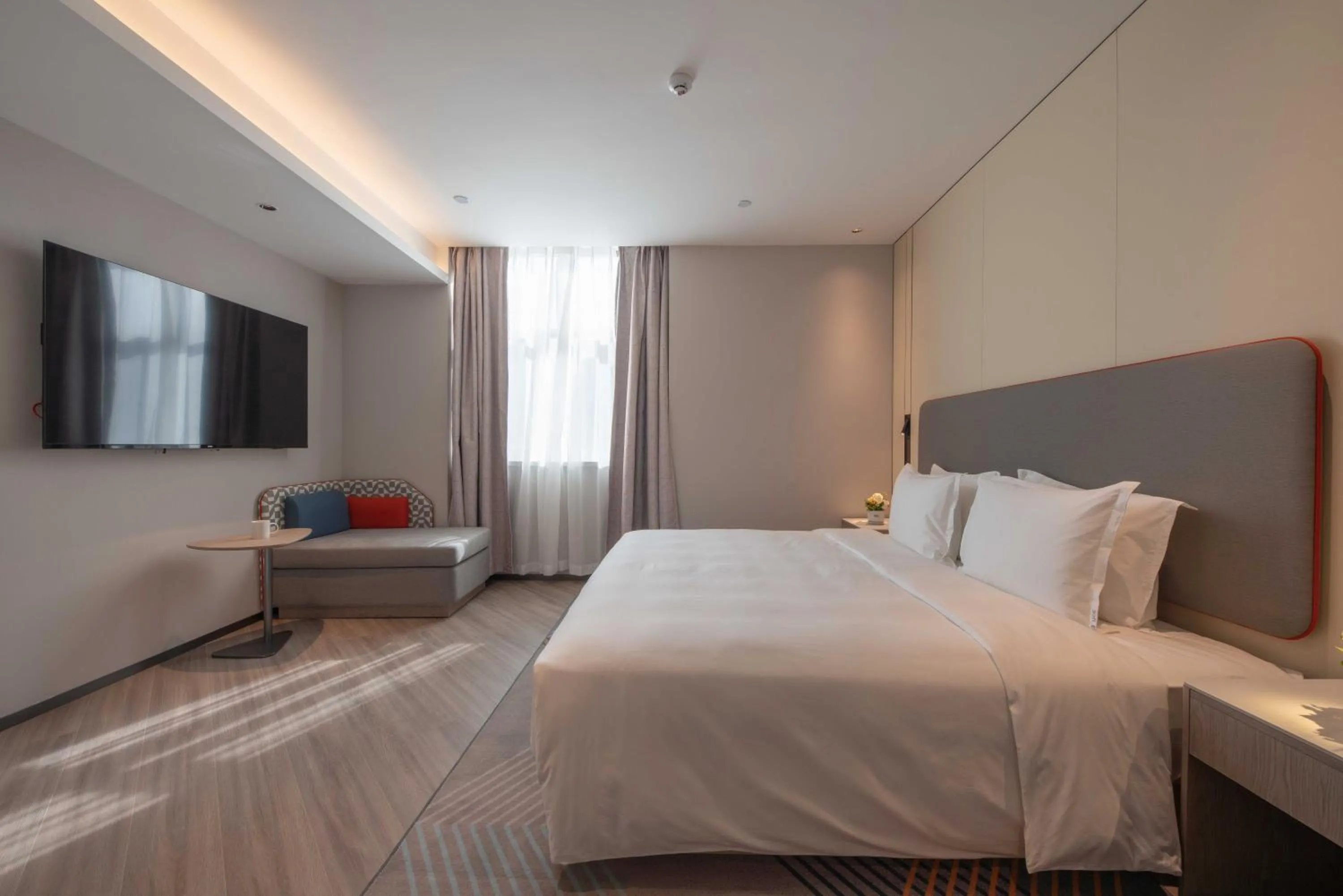 Bed in Holiday Inn Express Turpan, an IHG Hotel