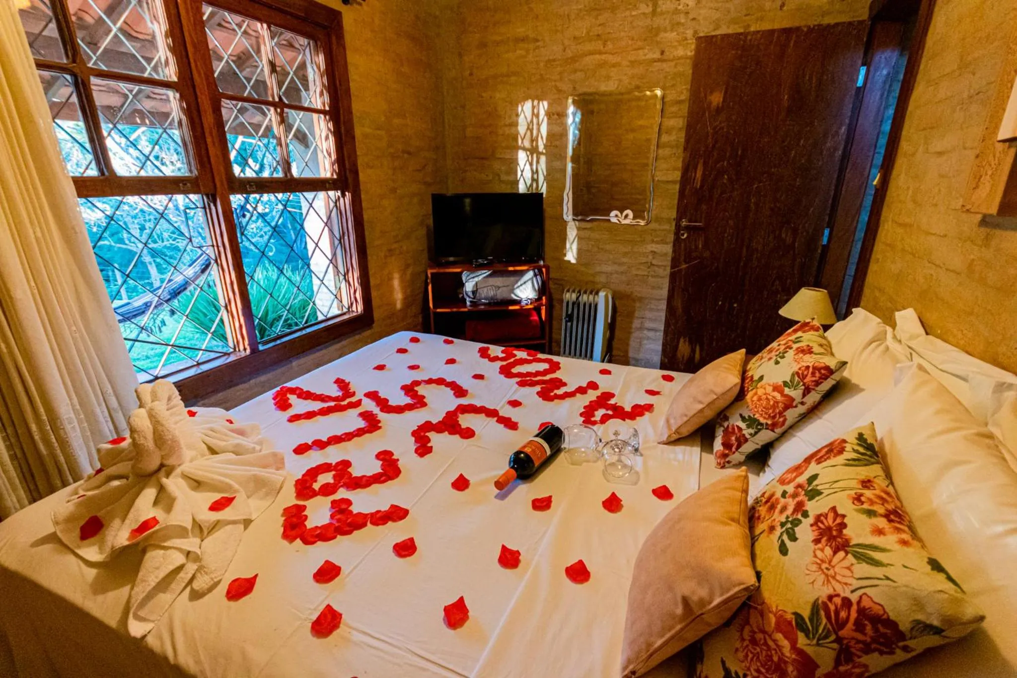 Bed in Pousada Chale Luiz