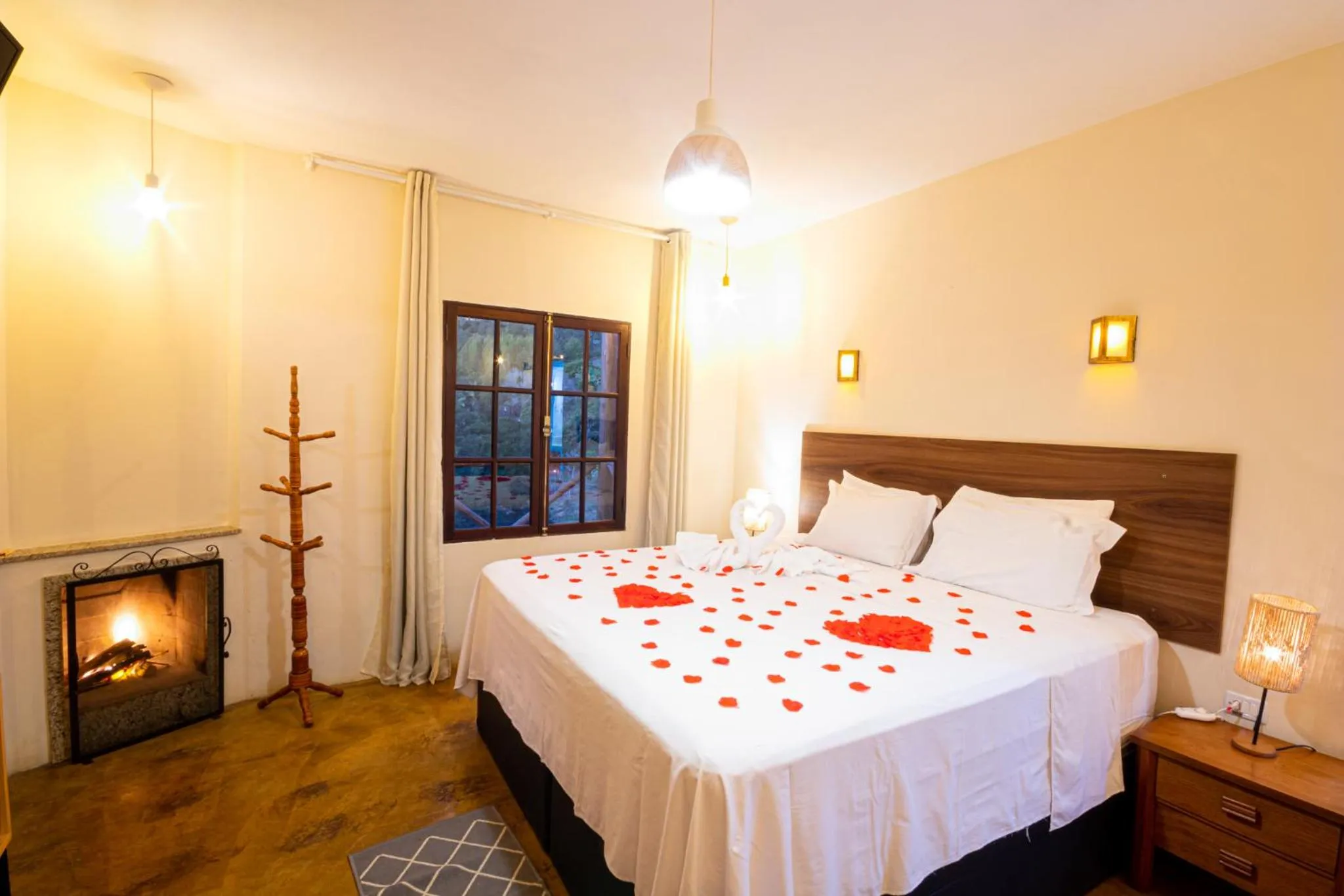 Bed in Pousada Chale Luiz