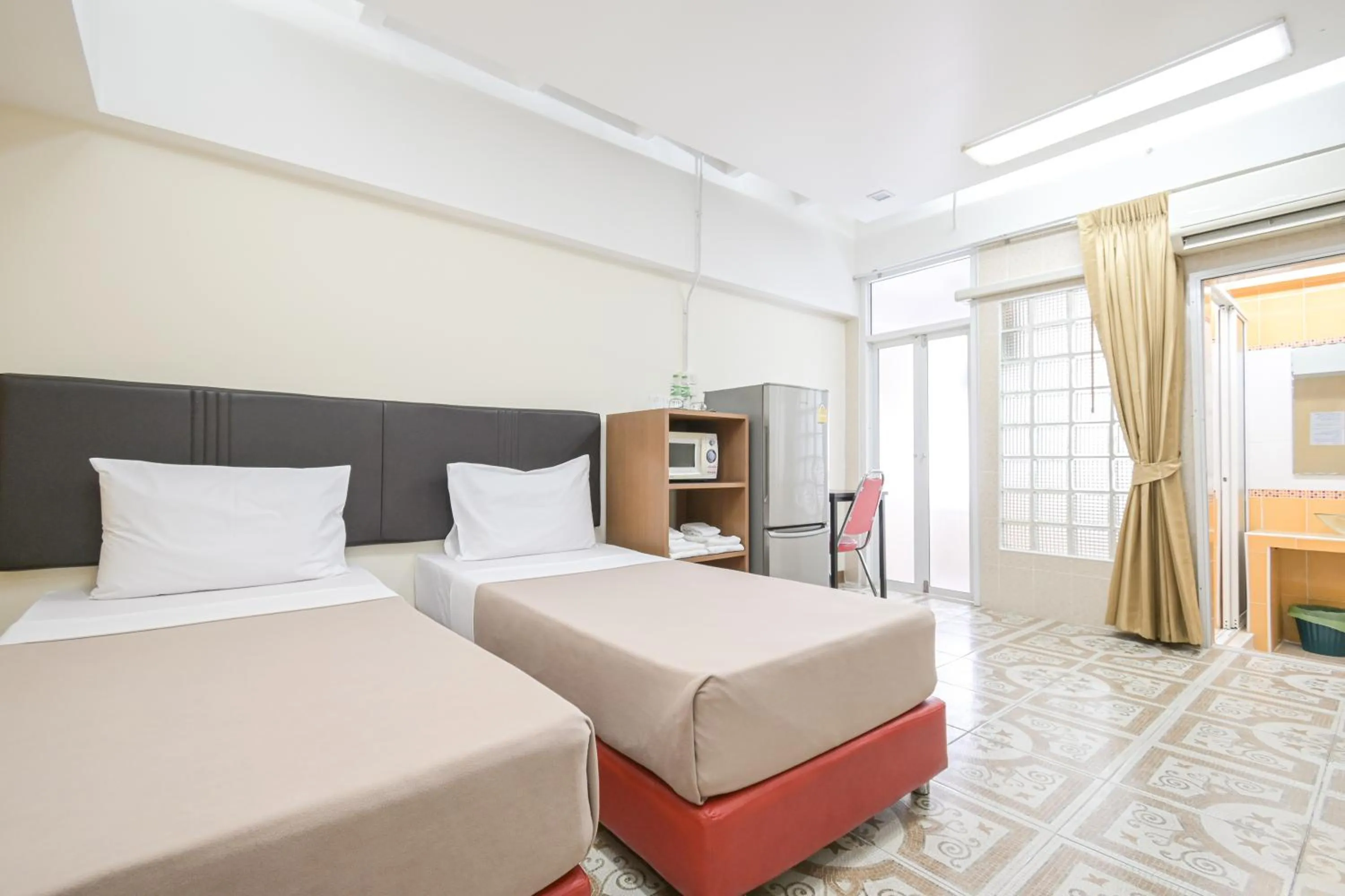 Bed in AC Habitat Bangkok