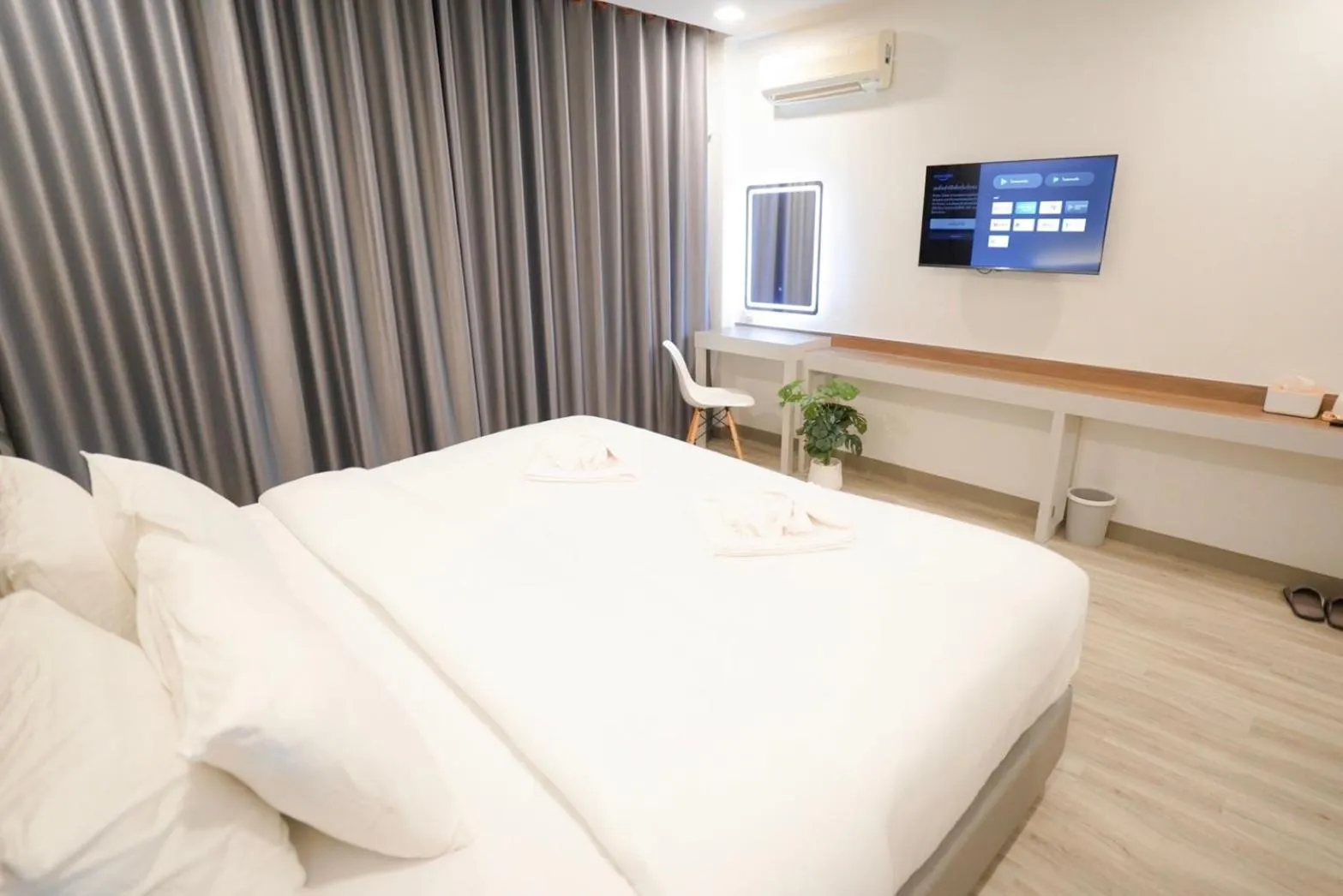 Bed in The Space Airport Hotel Chiang Rai