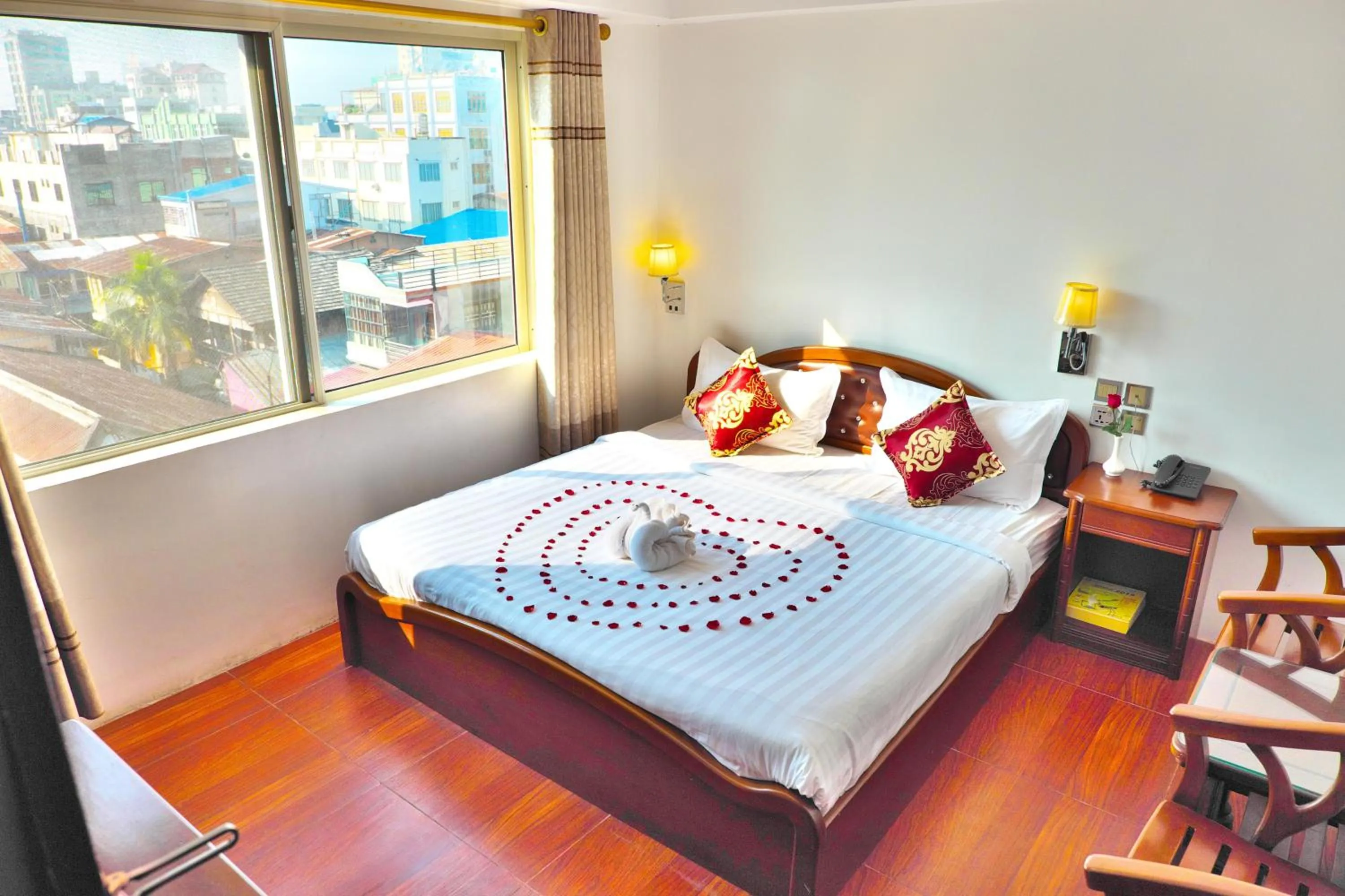 Bed in Kaung Myint Hotel