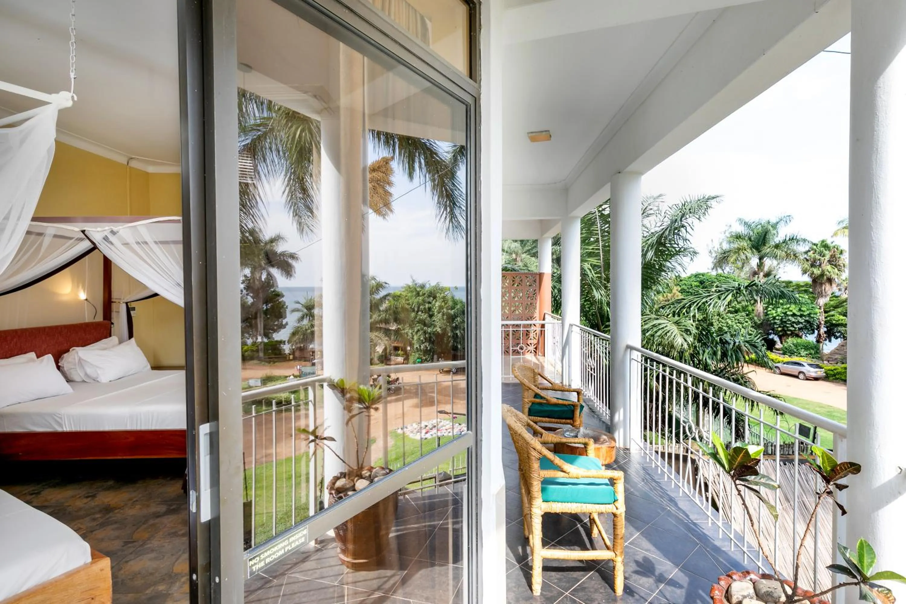 Patio, Bed in 2 Friends Beach Hotel