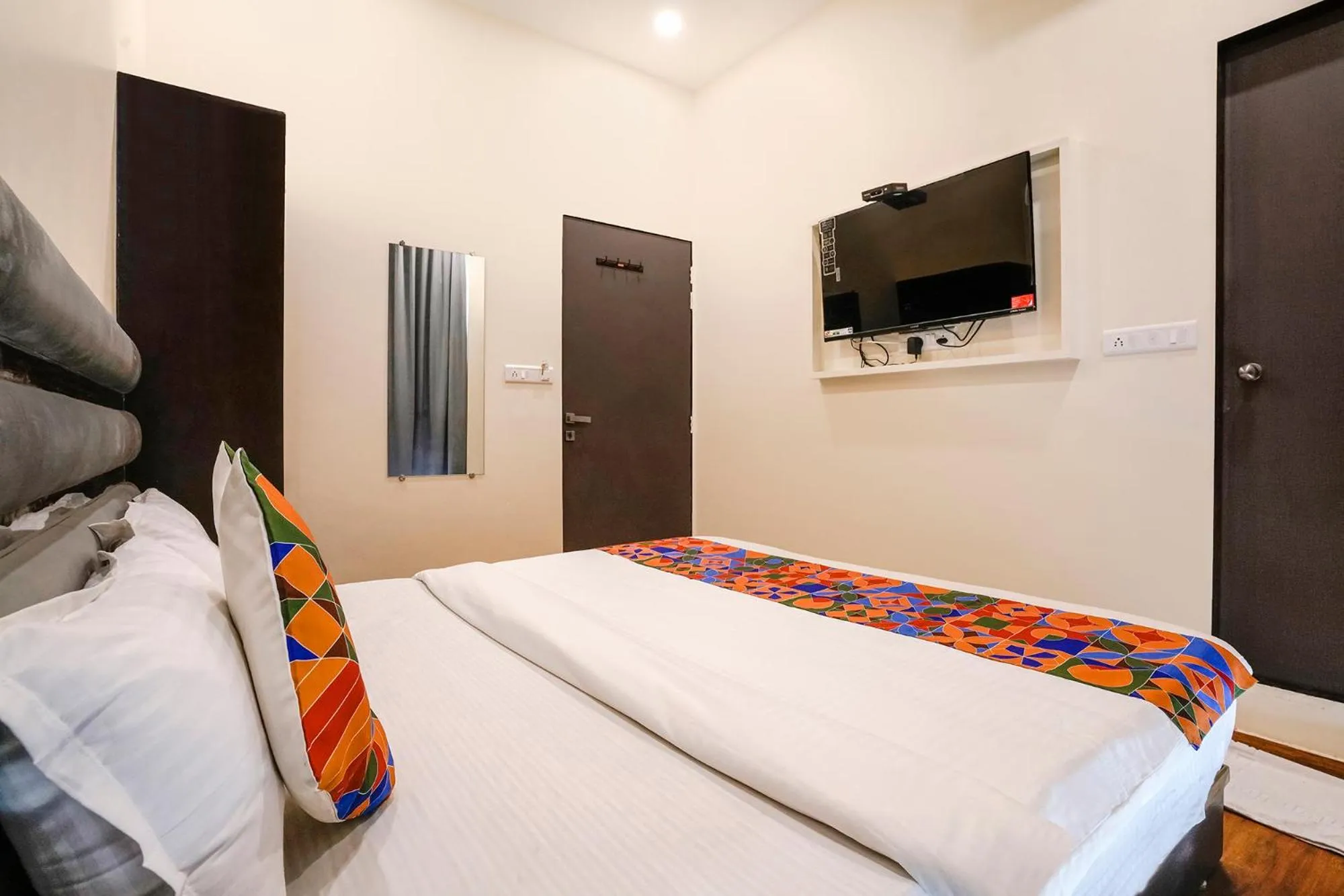 Bed in FabHotel Freedom International