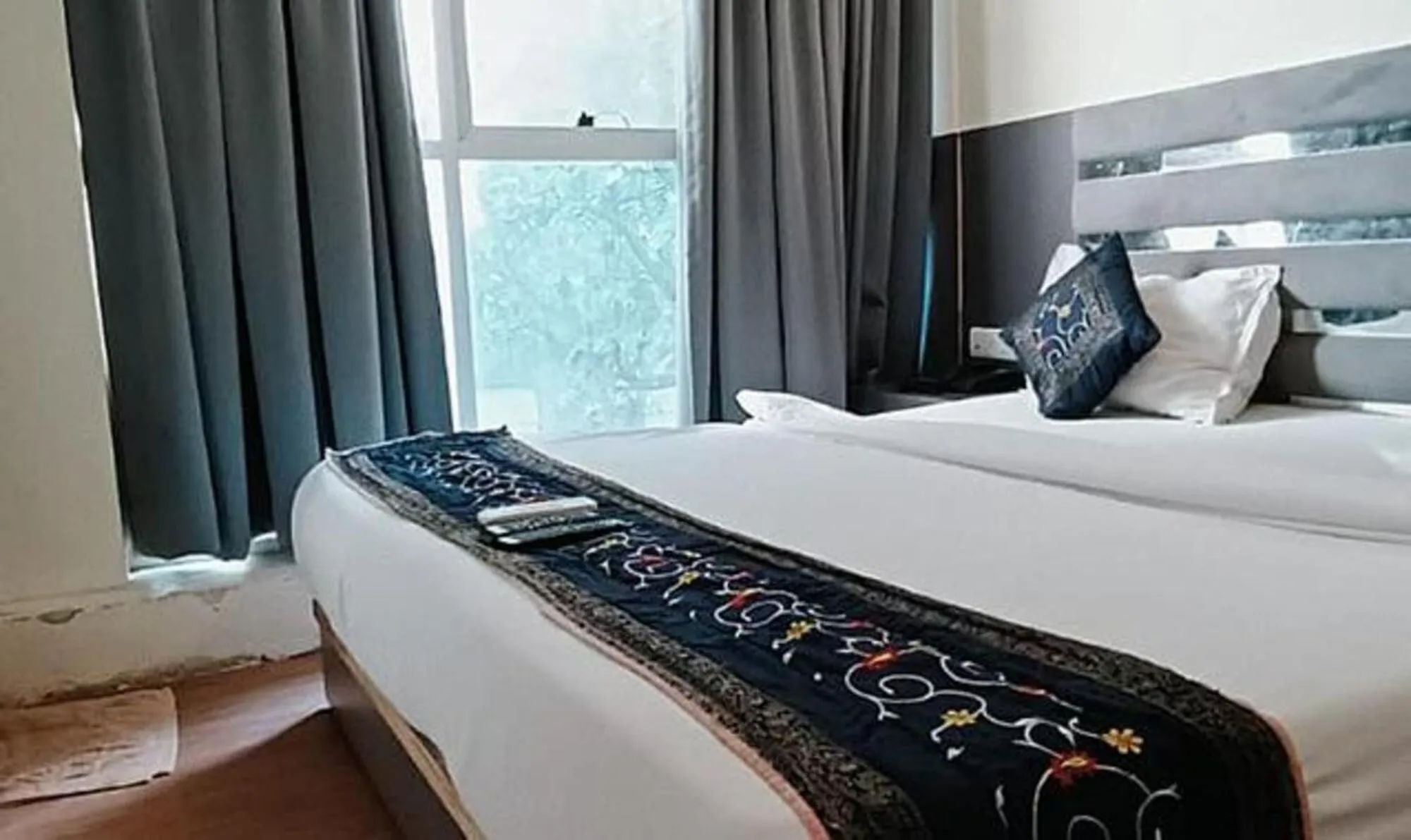 Bed in FabHotel Freedom International