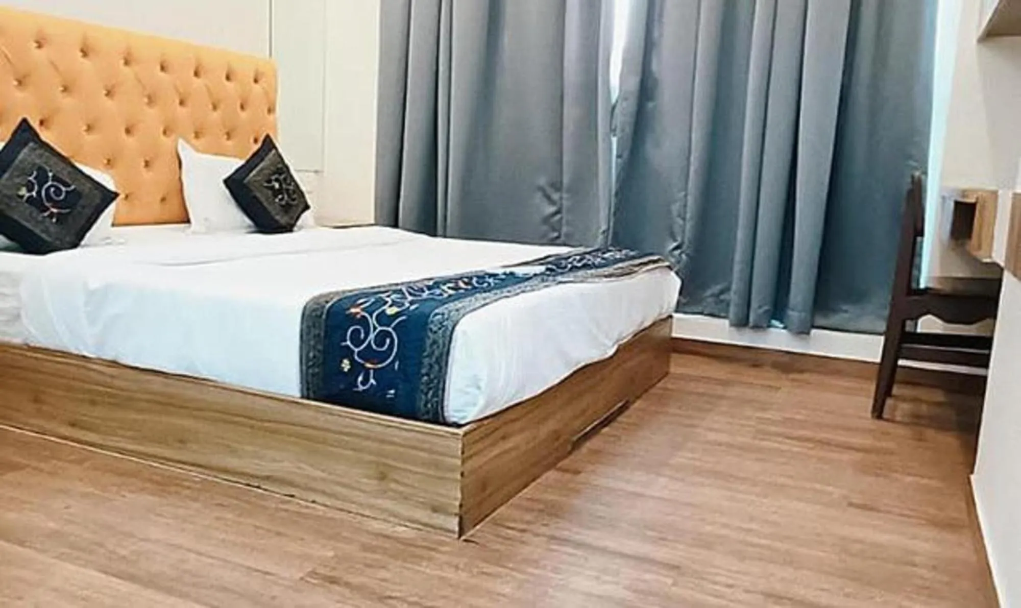 Bed in FabHotel Freedom International