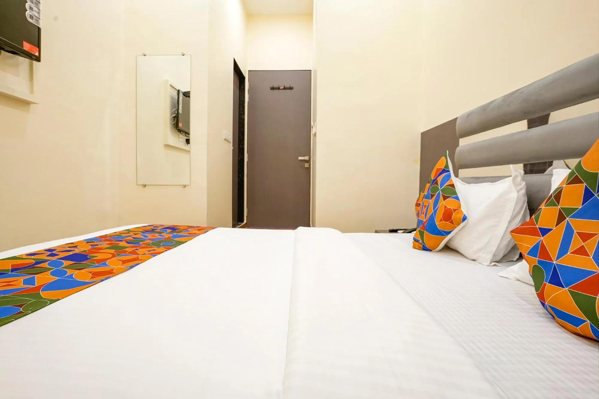 Bed in FabHotel Freedom International