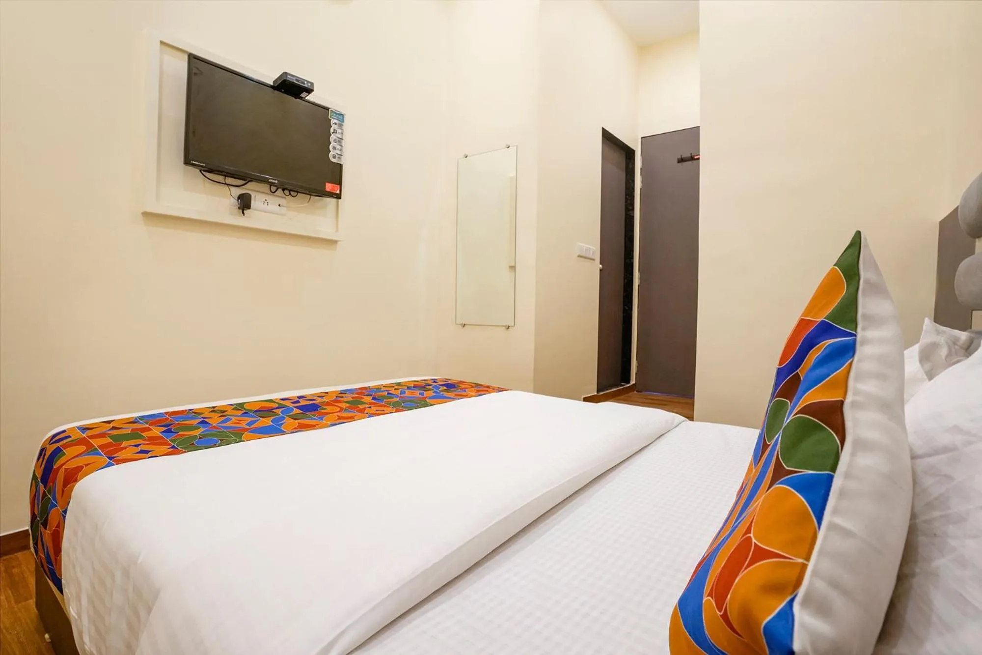 Bed in FabHotel Freedom International