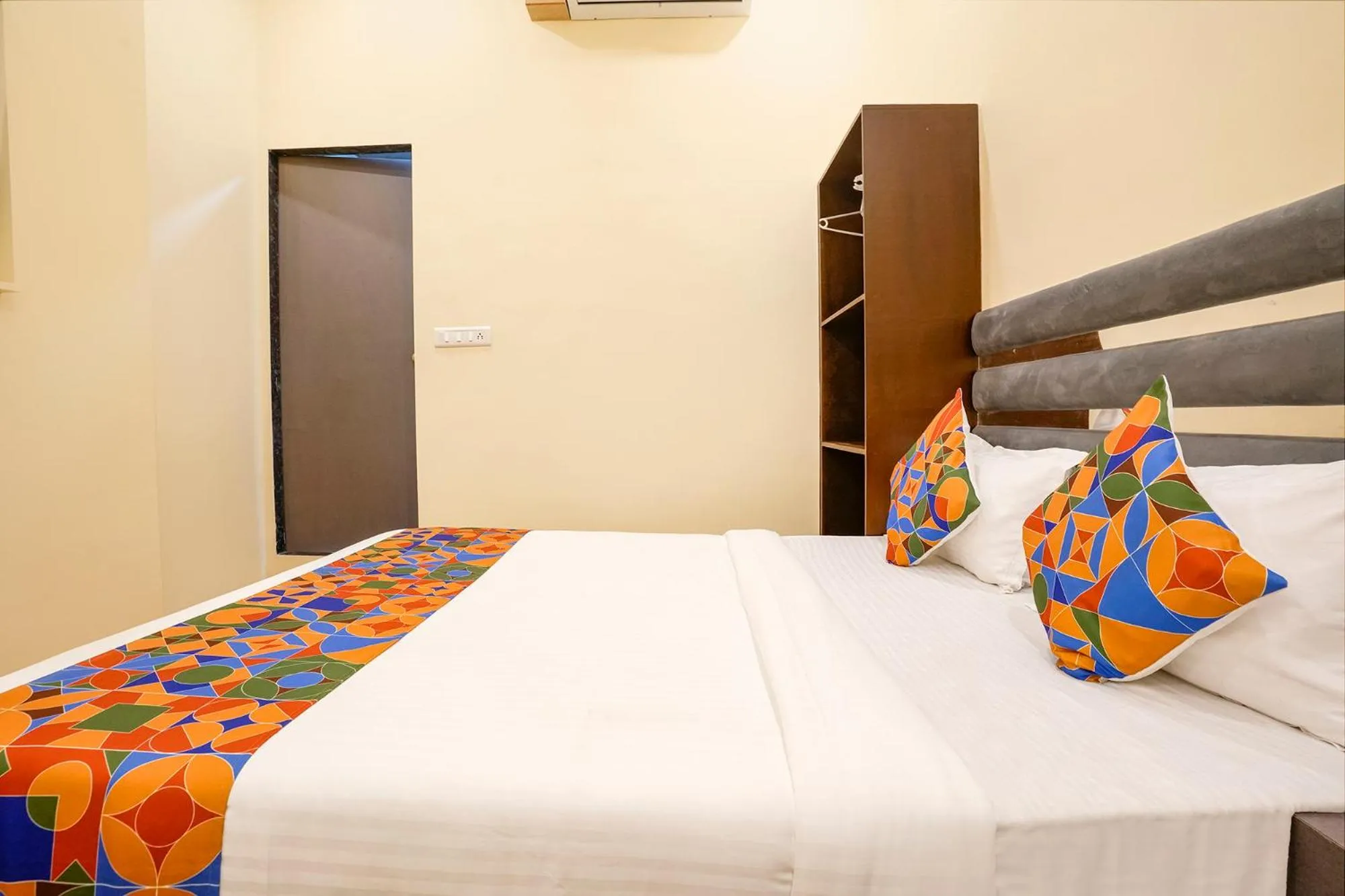 Bed in FabHotel Freedom International