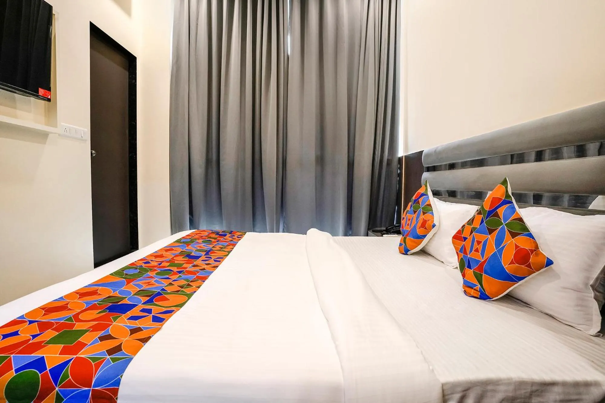 Bed in FabHotel Freedom International