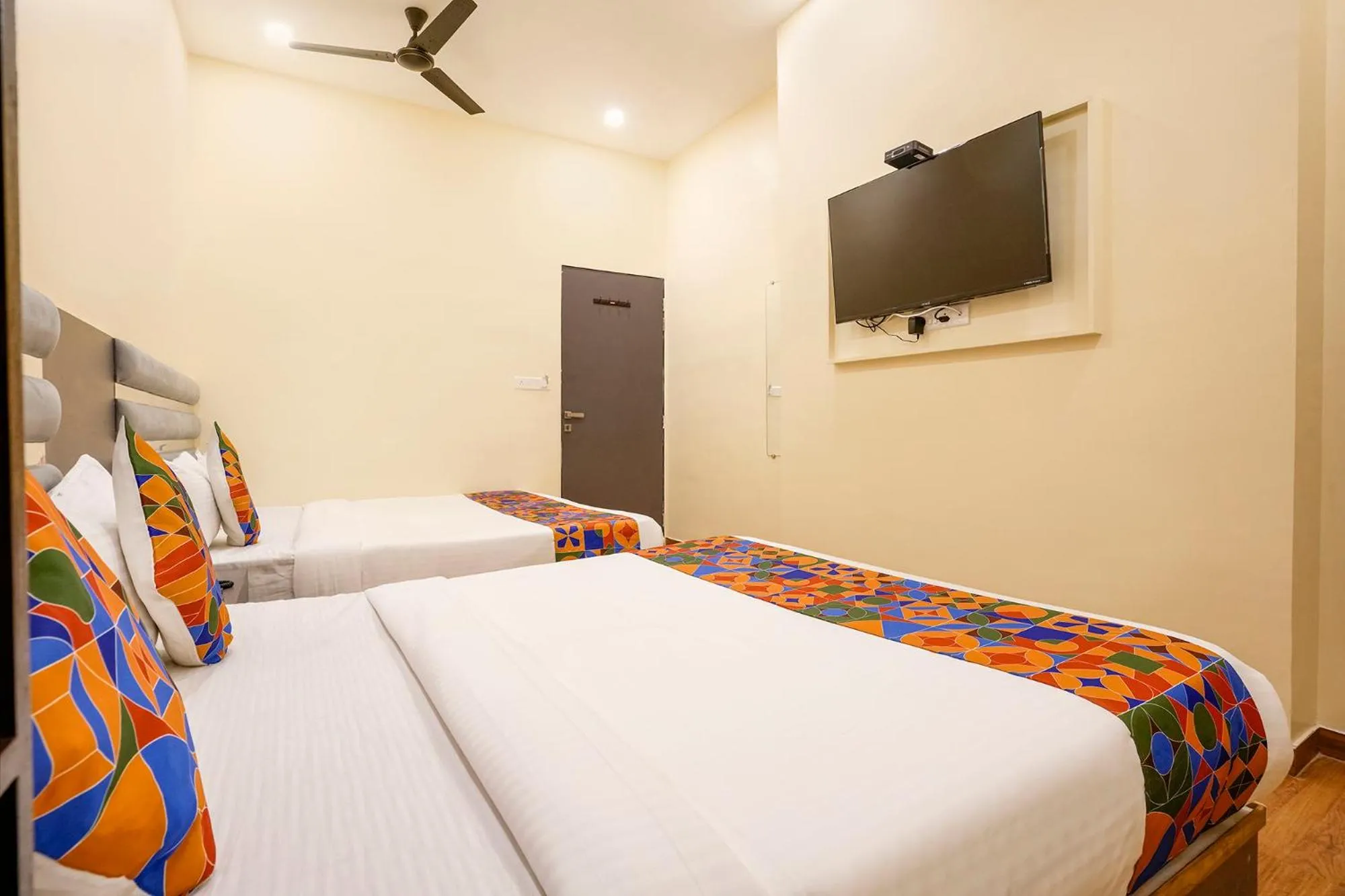 Bed in FabHotel Freedom International