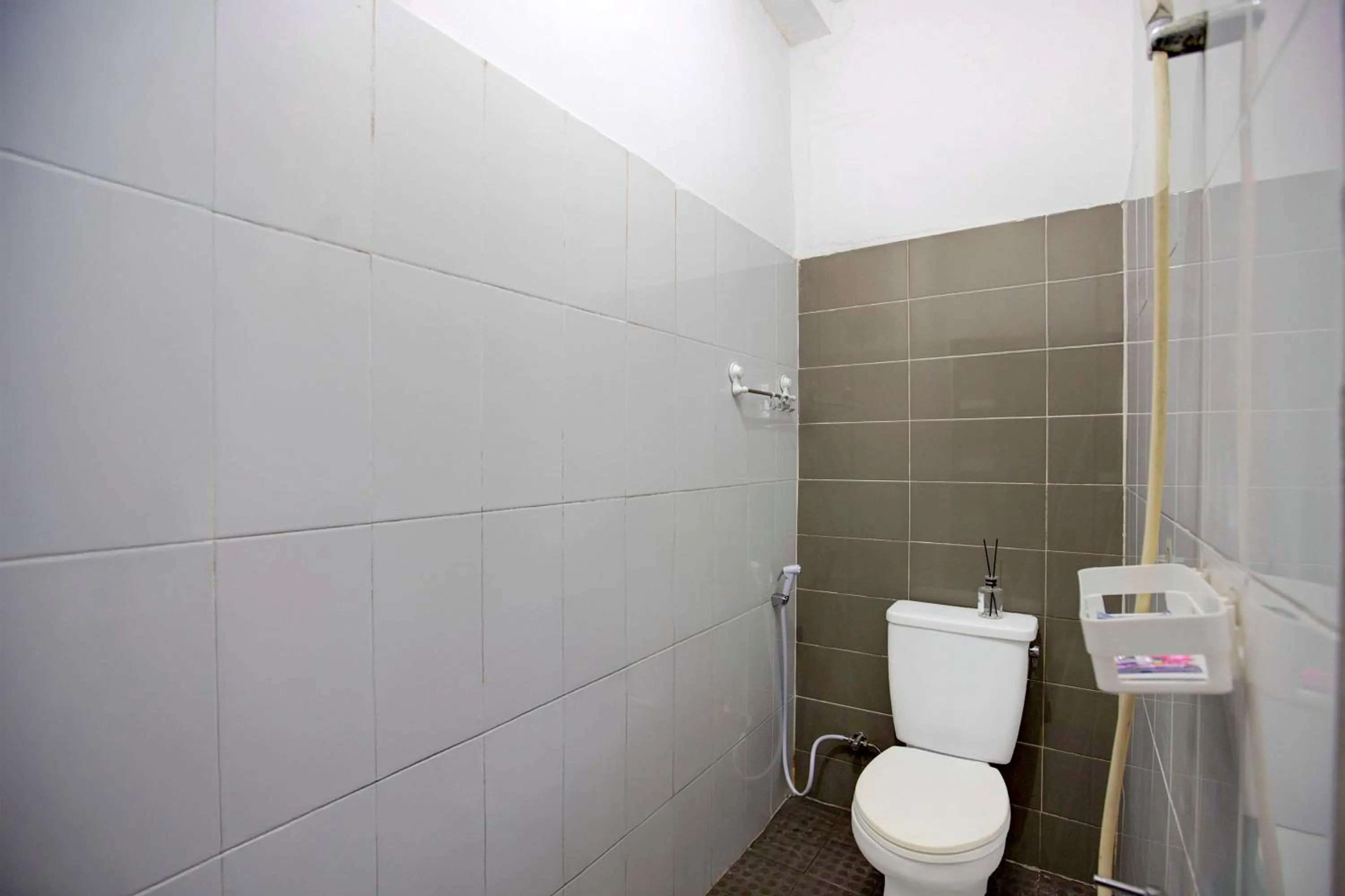 Bathroom in Hotel O Balikpapan near Taman Beruang Madu formerly Palm Cafe Inn