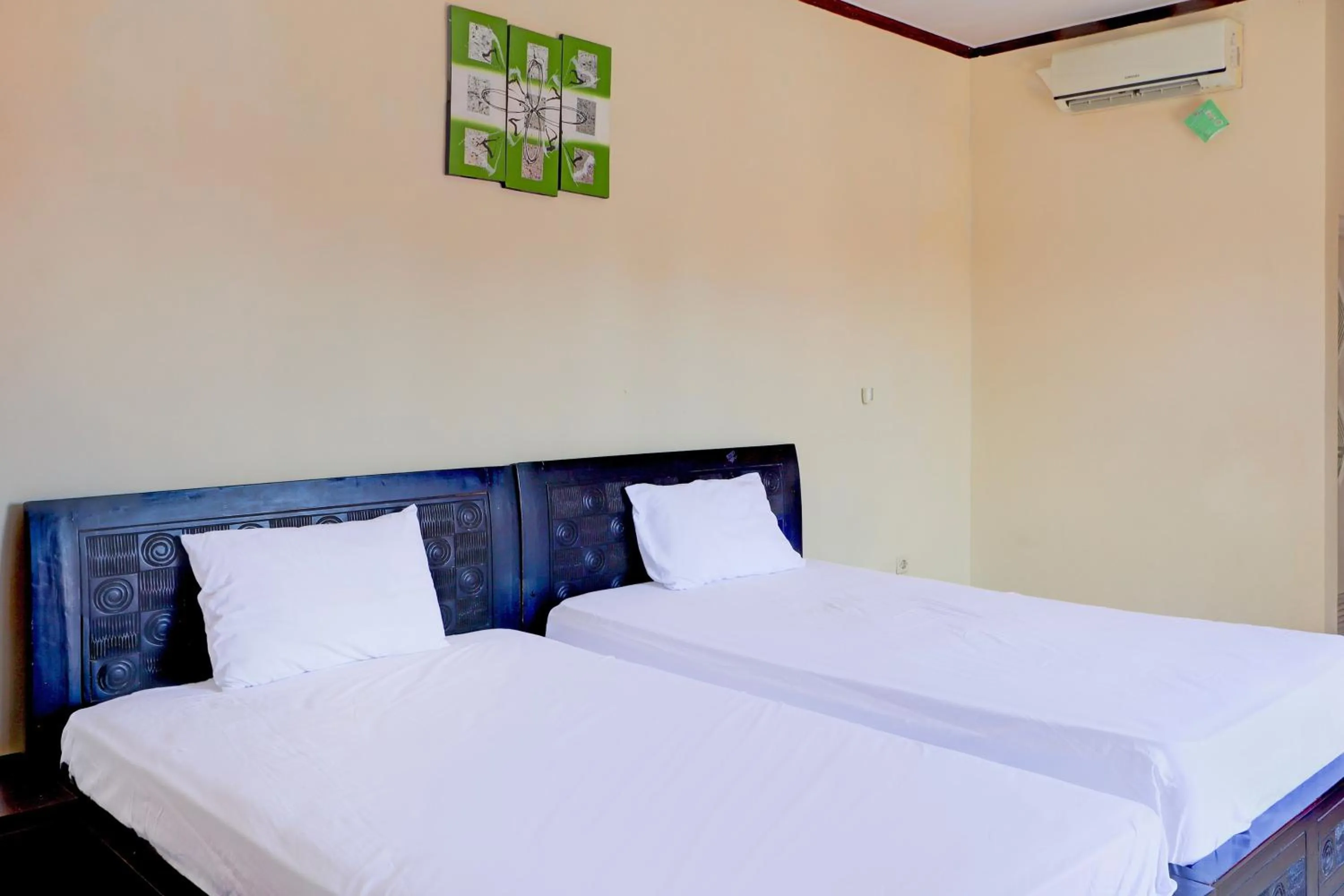 Bedroom, Bed in Collection O Near Bali Royal Hospital Renon Formerly JC Boutique Hotel