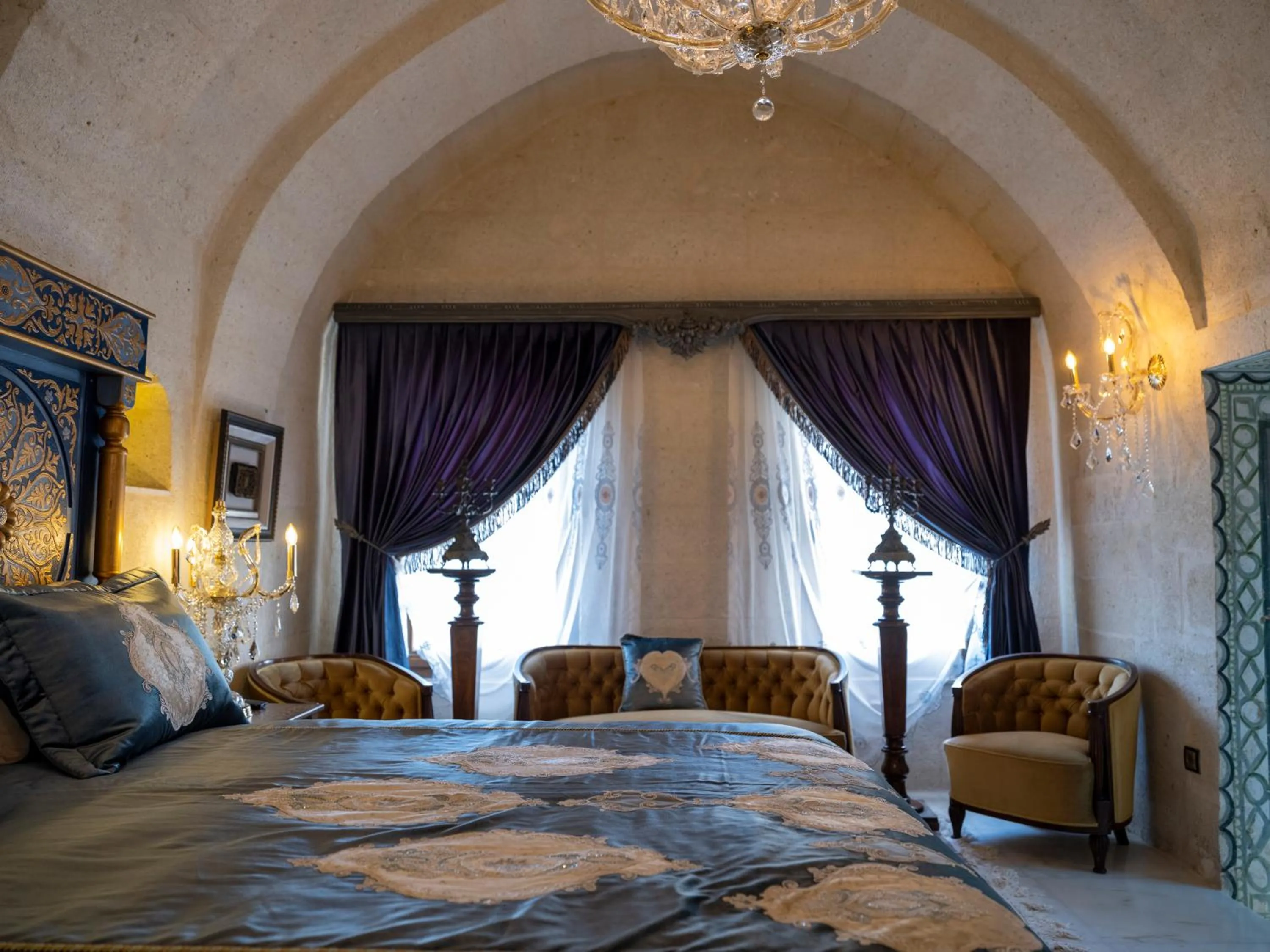 Bed in Elika Cave Suites & Spa