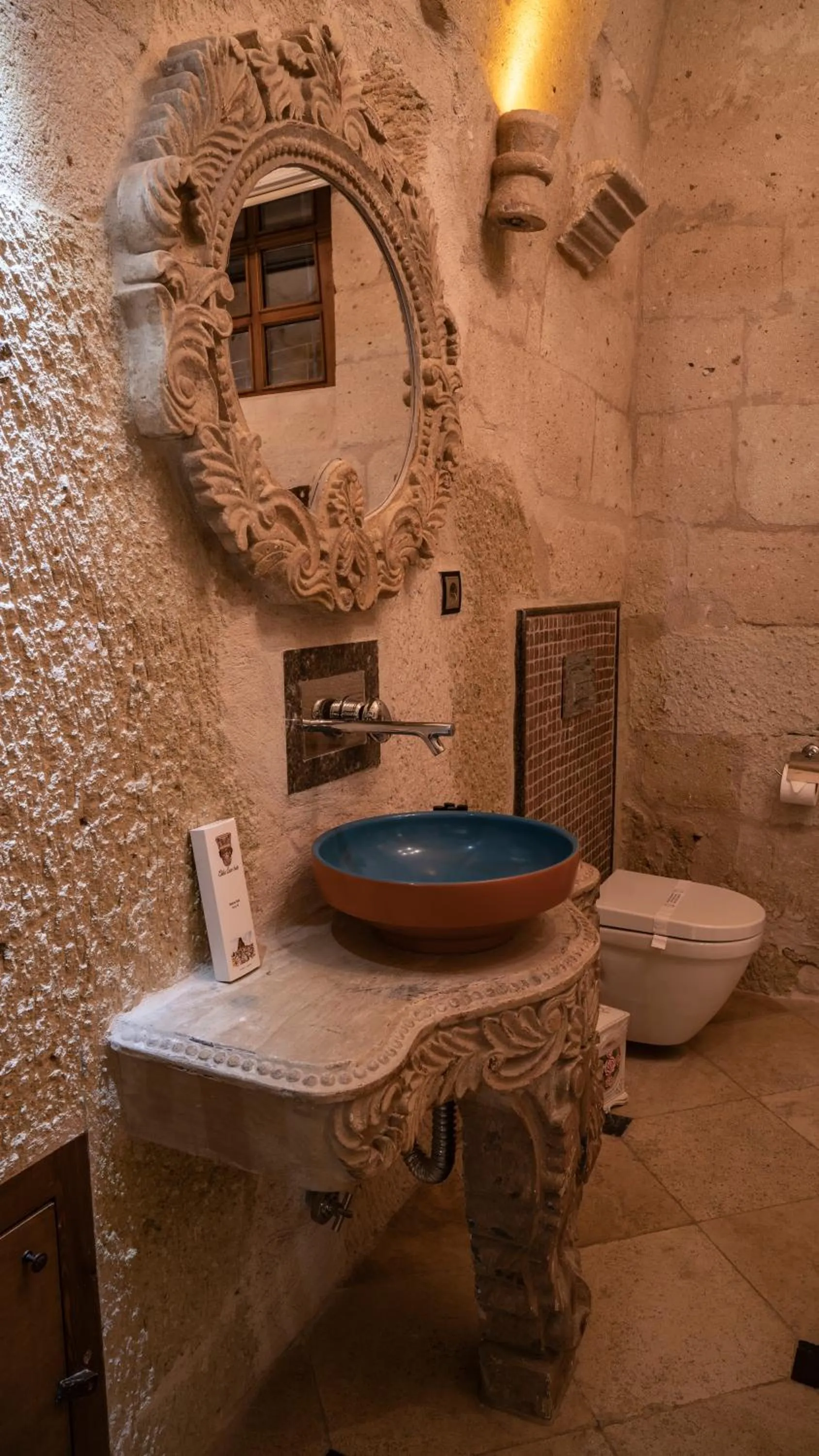 Toilet in Elika Cave Suites & Spa