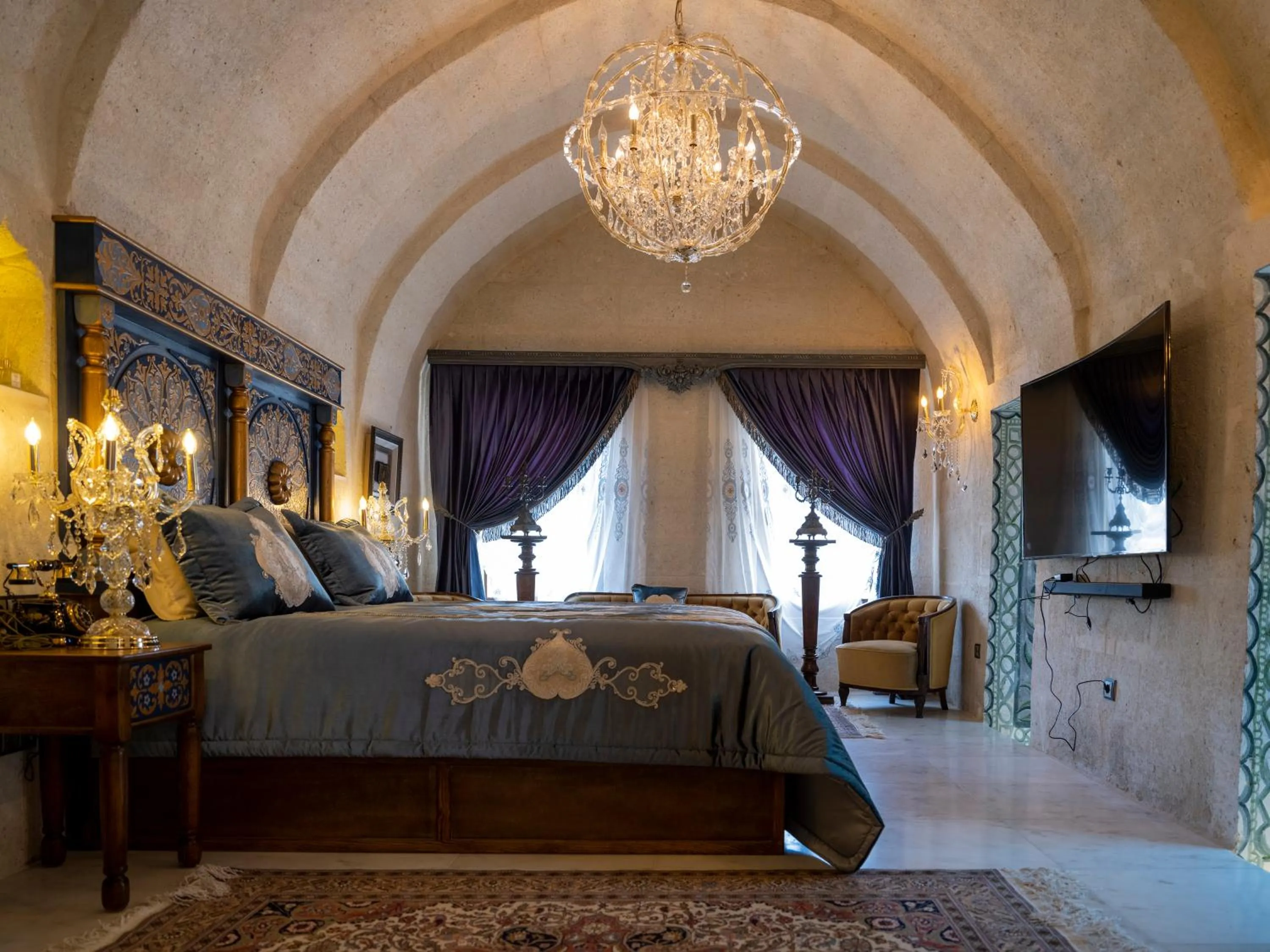 Bed in Elika Cave Suites & Spa