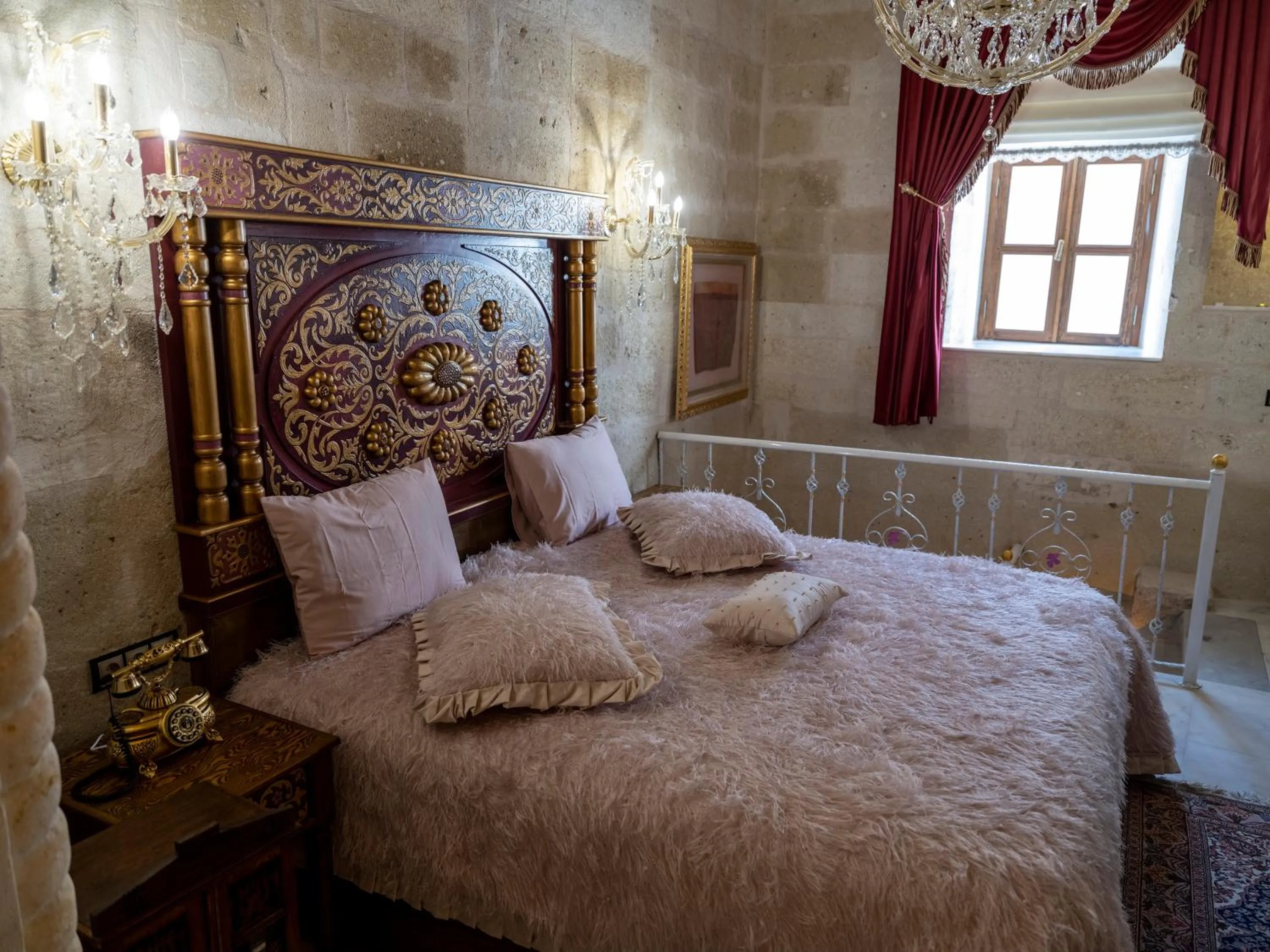 Bed in Elika Cave Suites & Spa