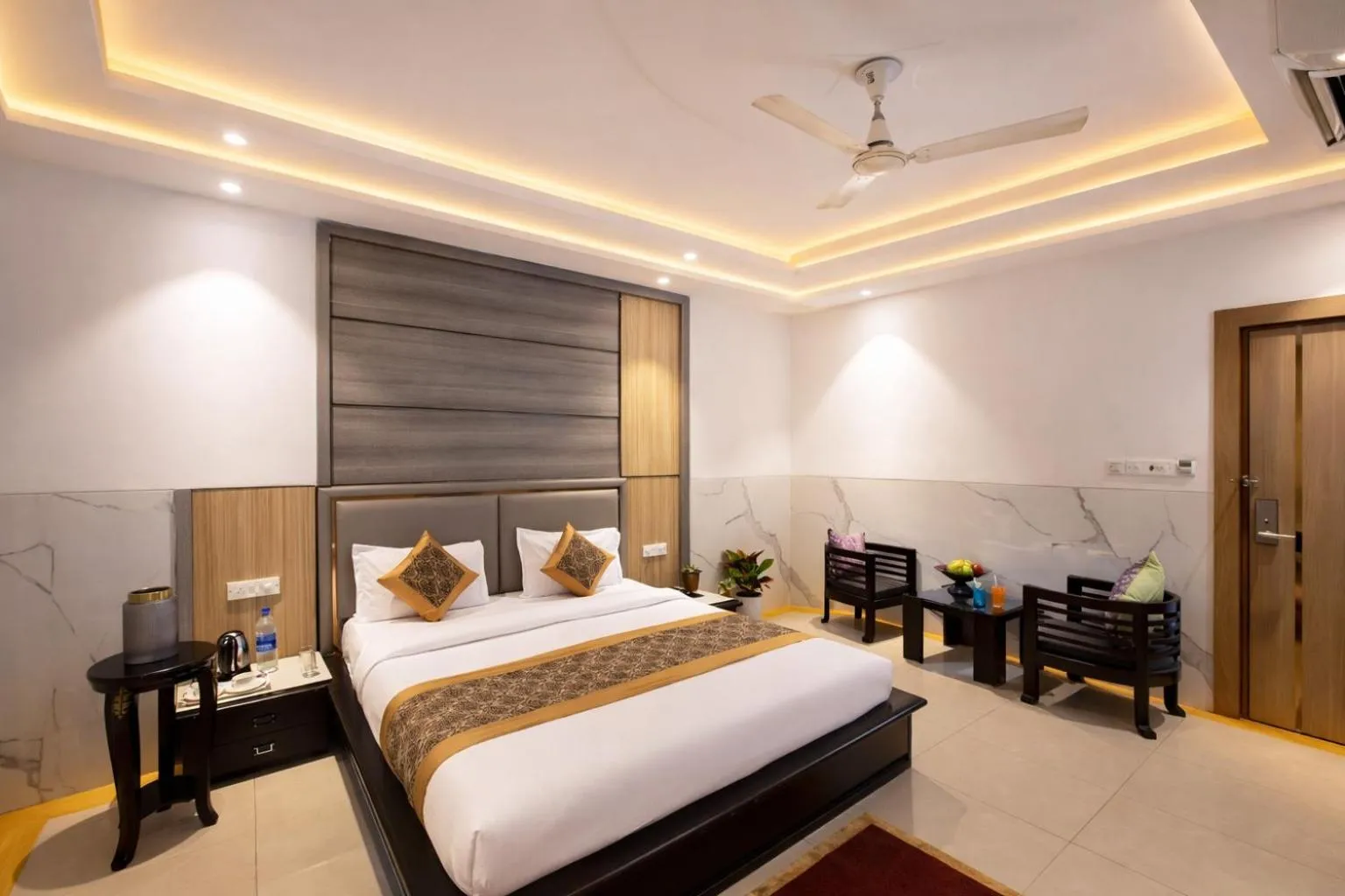 Living room, Bed in Hotel DELHI 37 by STAR GROUP