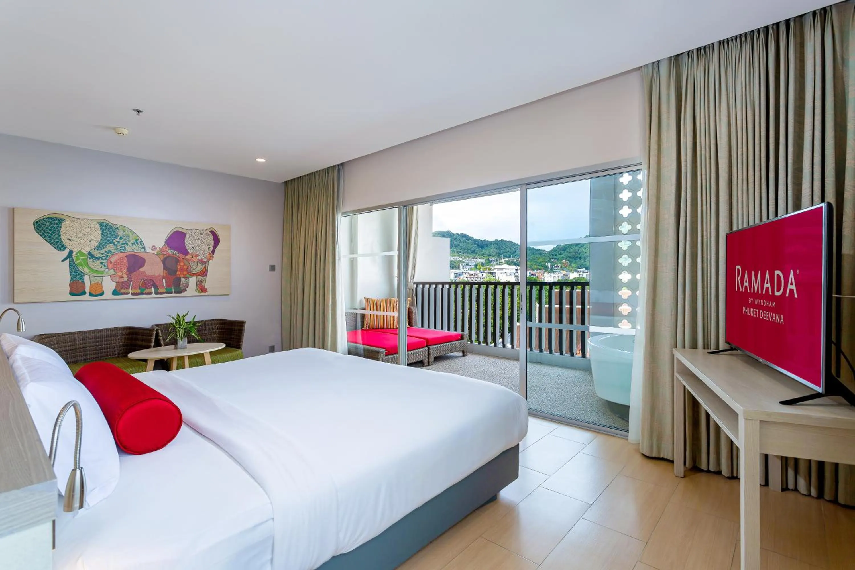 Balcony/Terrace, Bed in Ramada by Wyndham Phuket Deevana