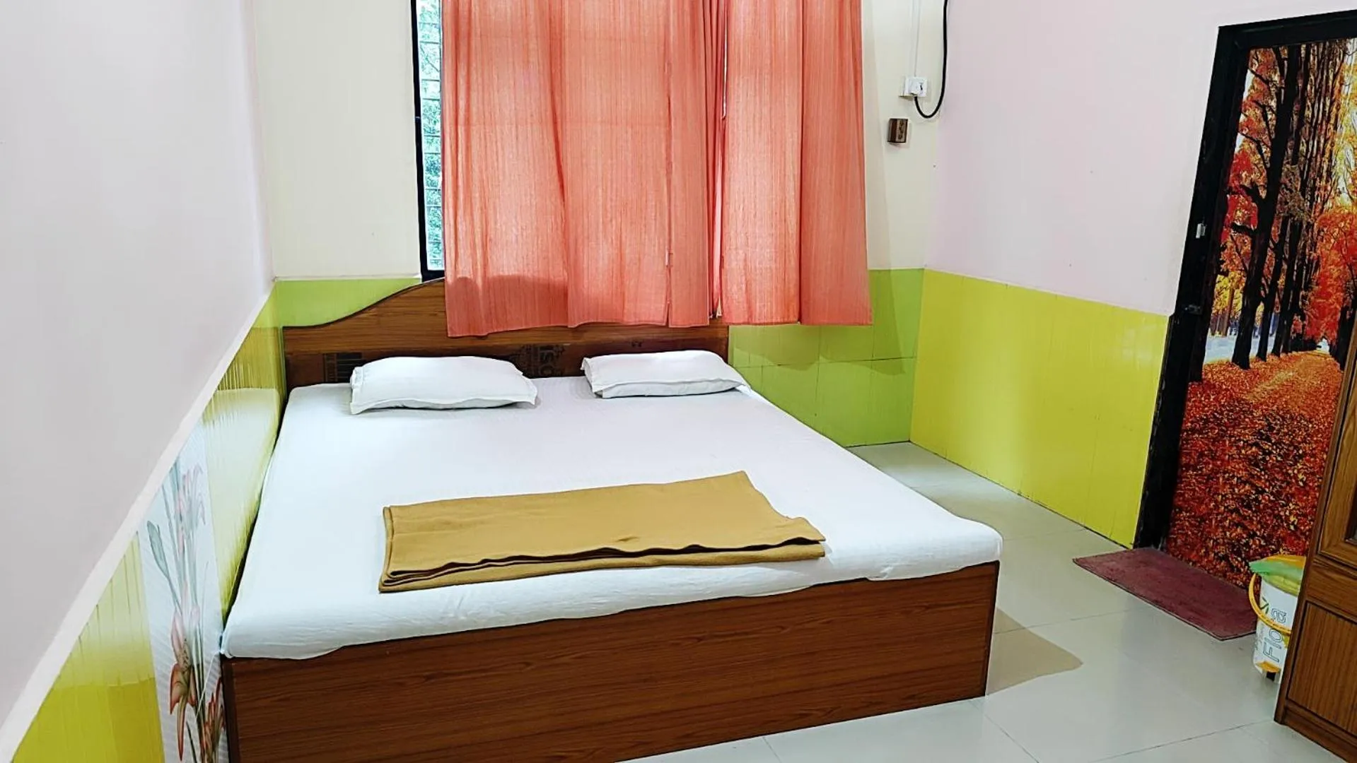 Bed in Jogalekar Cottage Alibaug