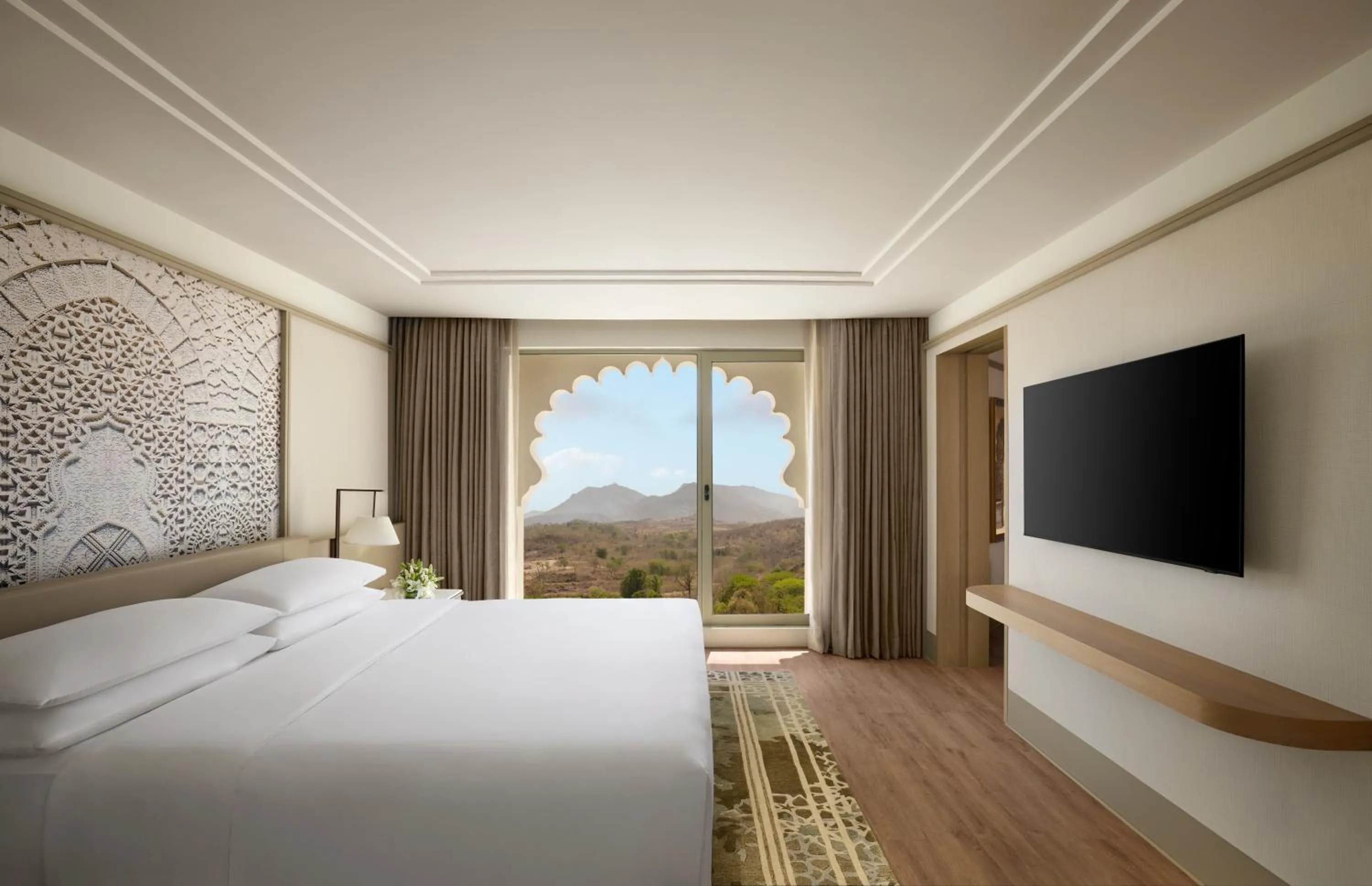 Deluxe King Suite with Sofa Bed: Enjoy INR 1500 hotel credits per stay - single occupancy in Udaipur Marriott Hotel