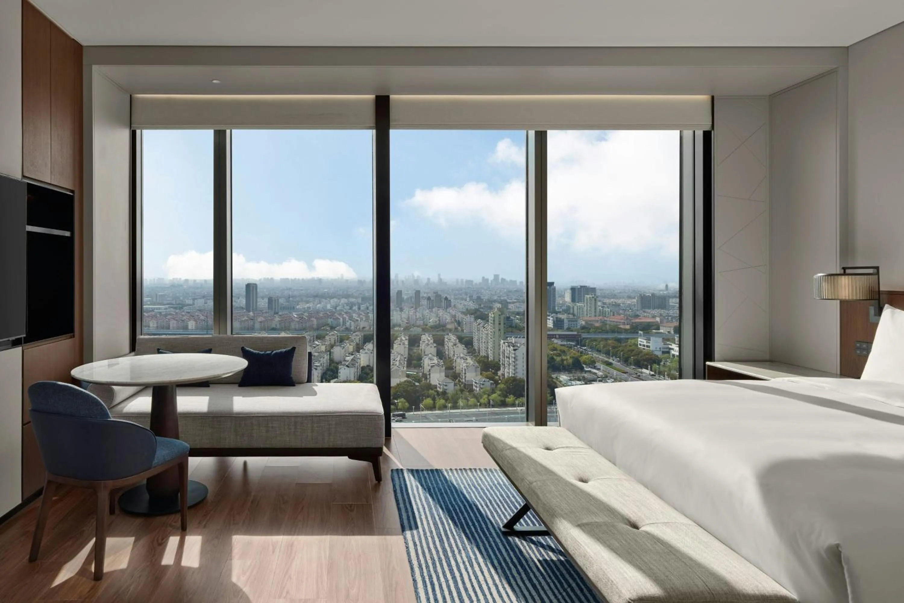 Photo of the whole room, Bed in Marriott Executive Apartments Suzhou Industrial Park