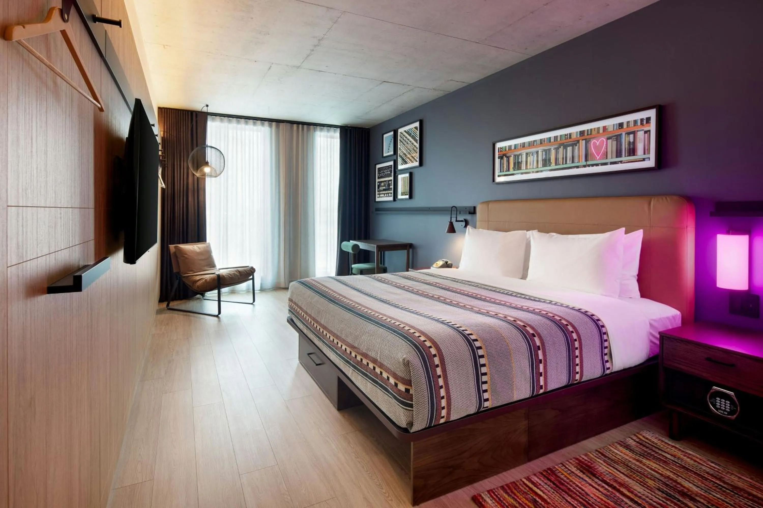 Photo of the whole room, Bed in Moxy Montreal Downtown