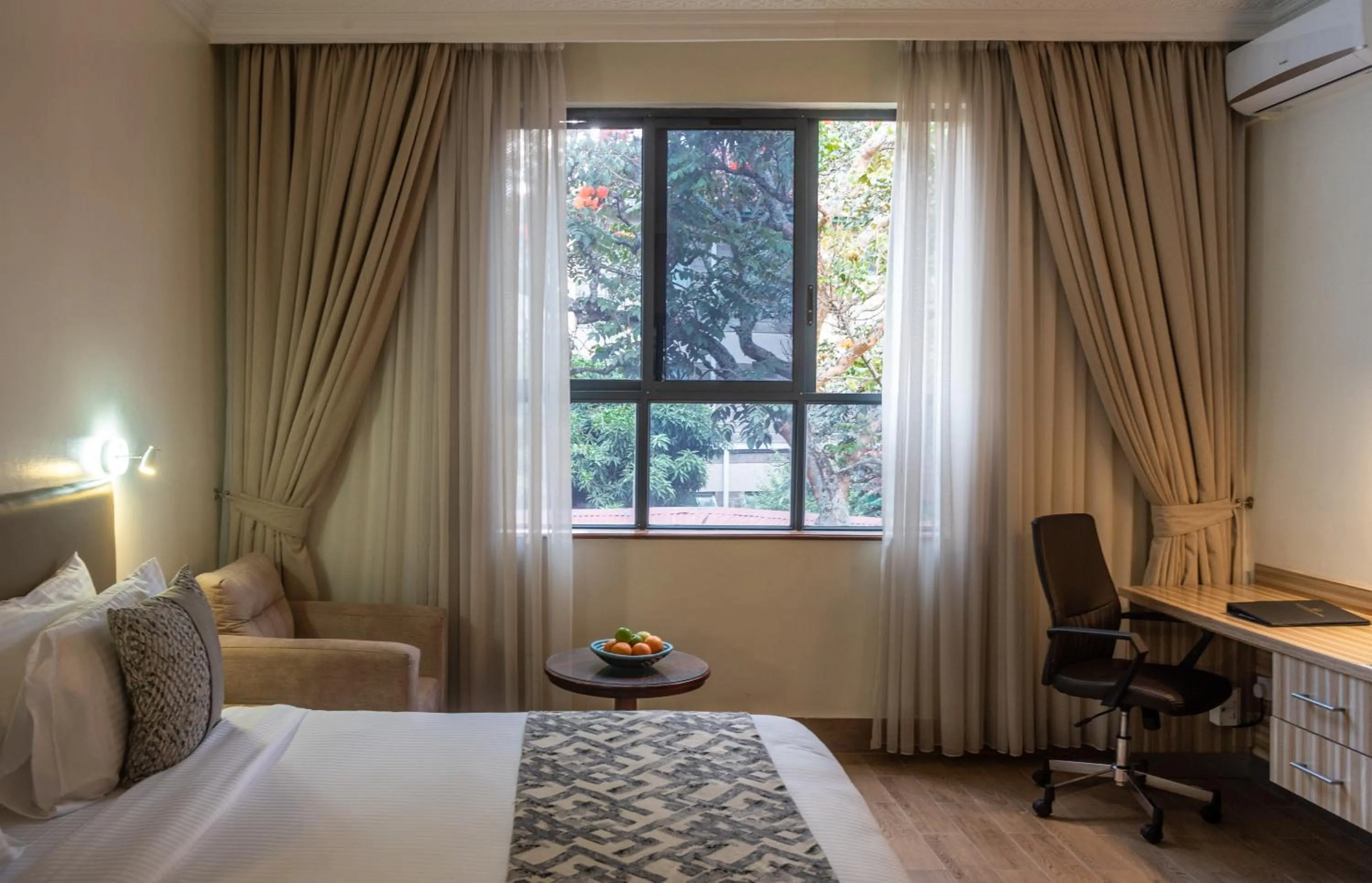 Photo of the whole room, Bed in Sportsview Hotel Kasarani