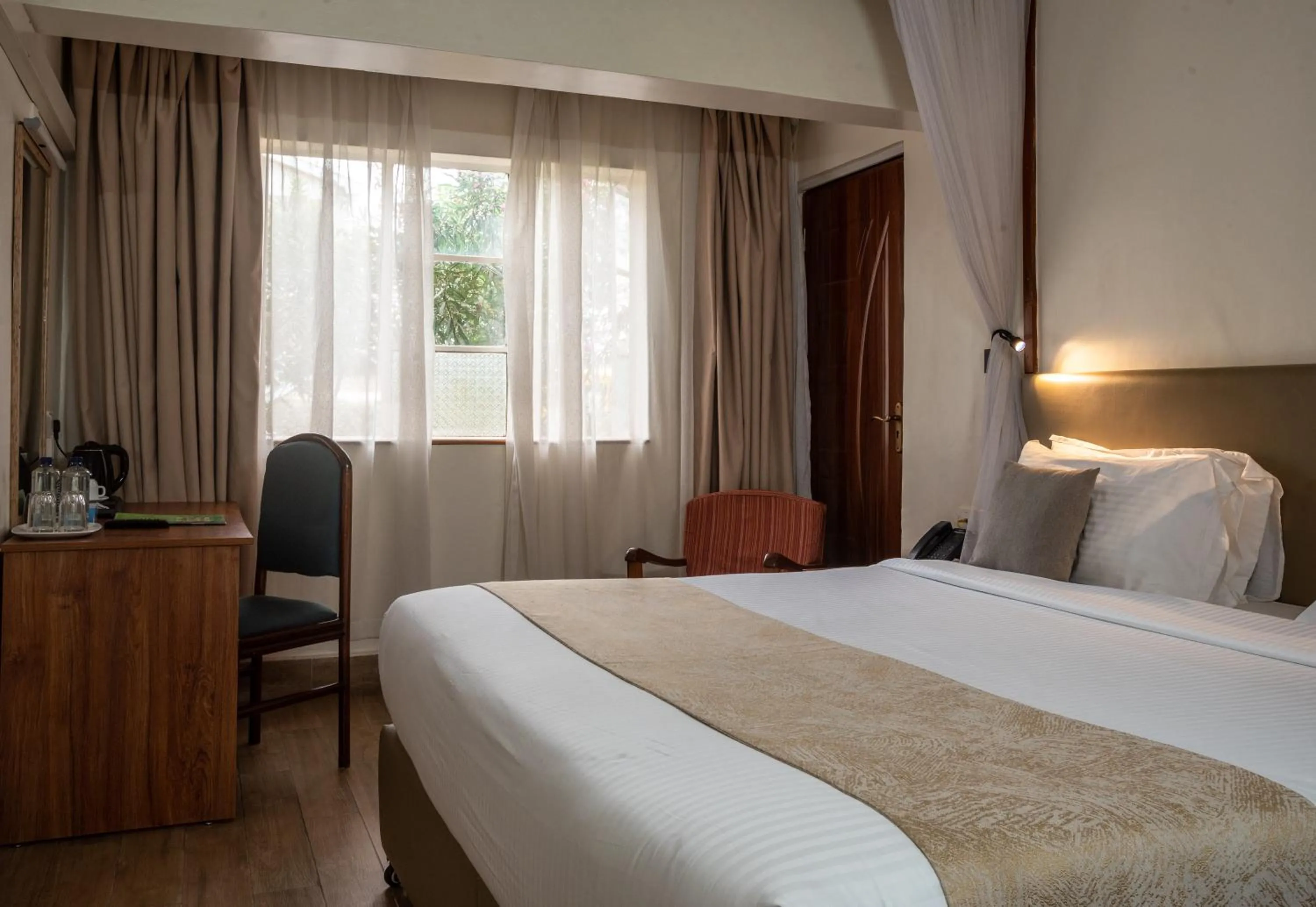 Photo of the whole room, Bed in Sportsview Hotel Kasarani