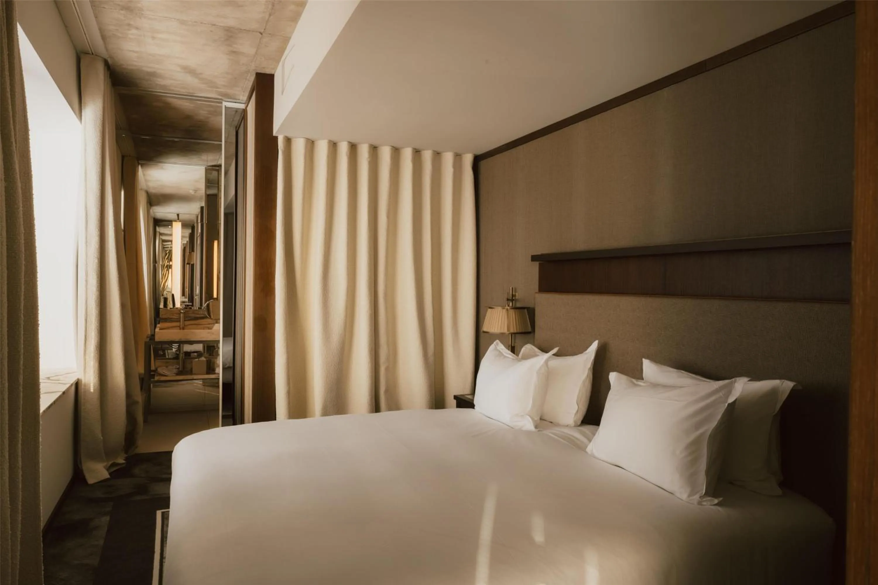 Bed in Maison Heler Metz, Curio Collection By Hilton