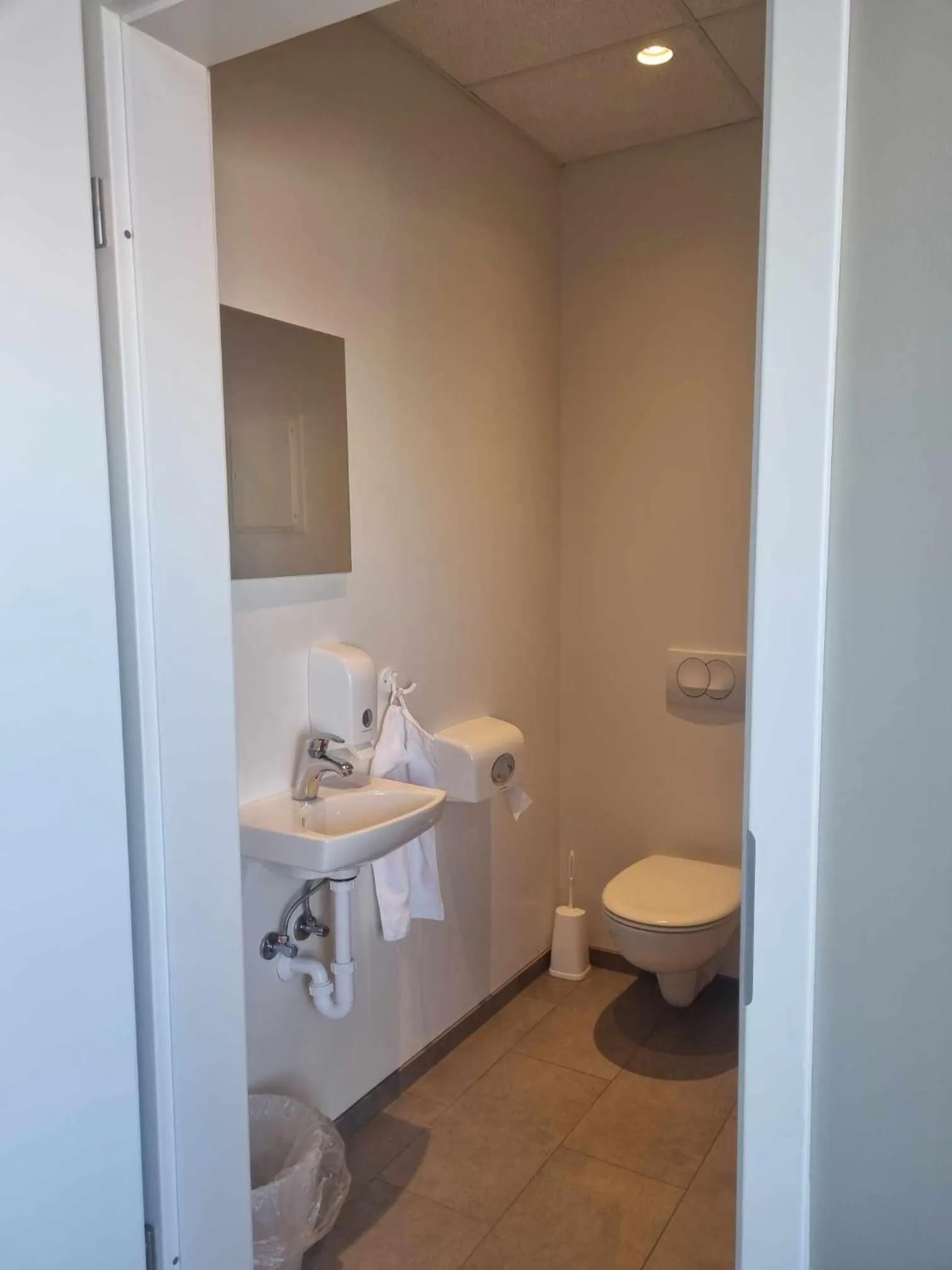 Toilet, Bed in Við Hafið Guesthouse