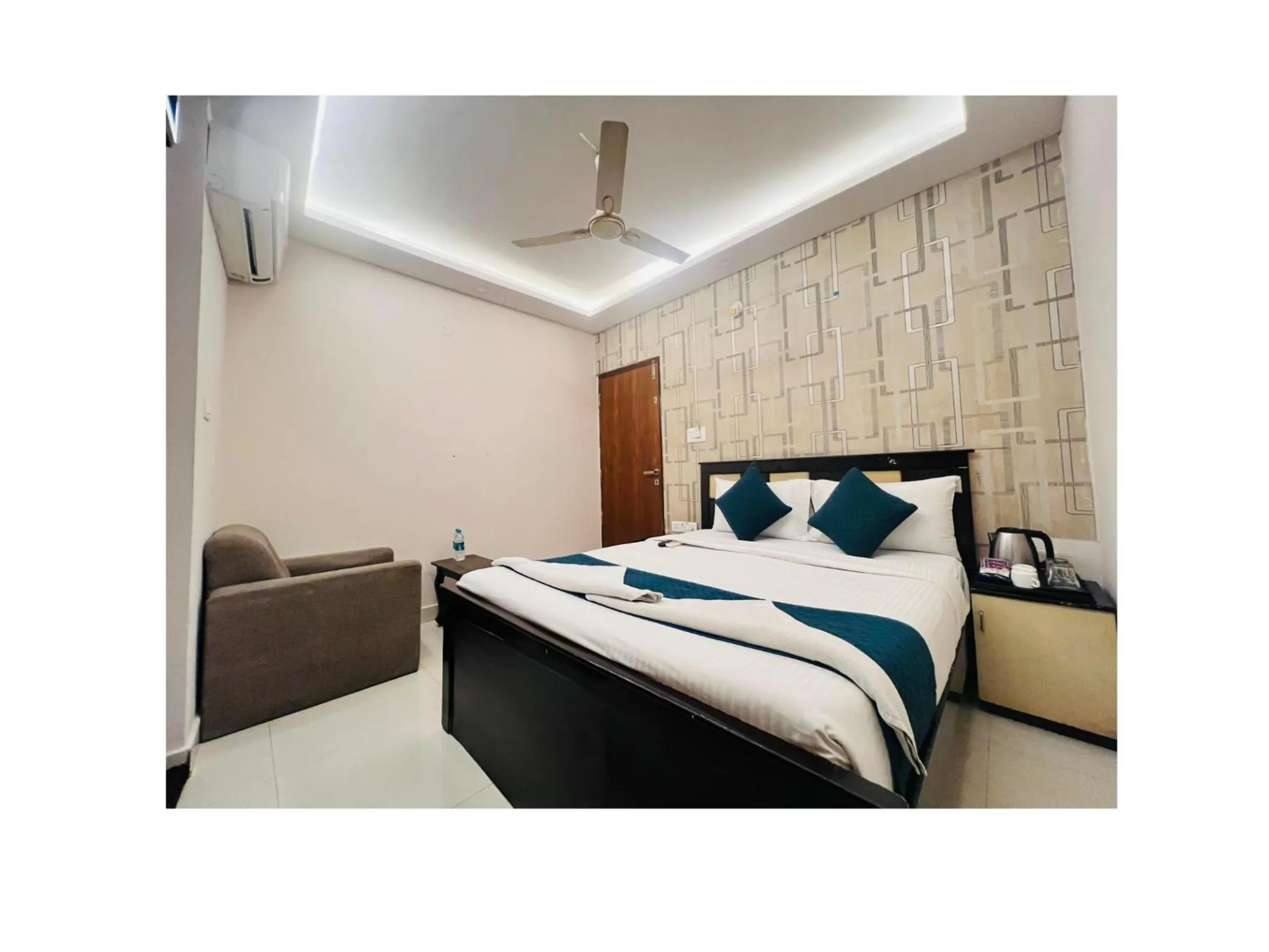 Bed in Blue Bliss Suites By PPH Living