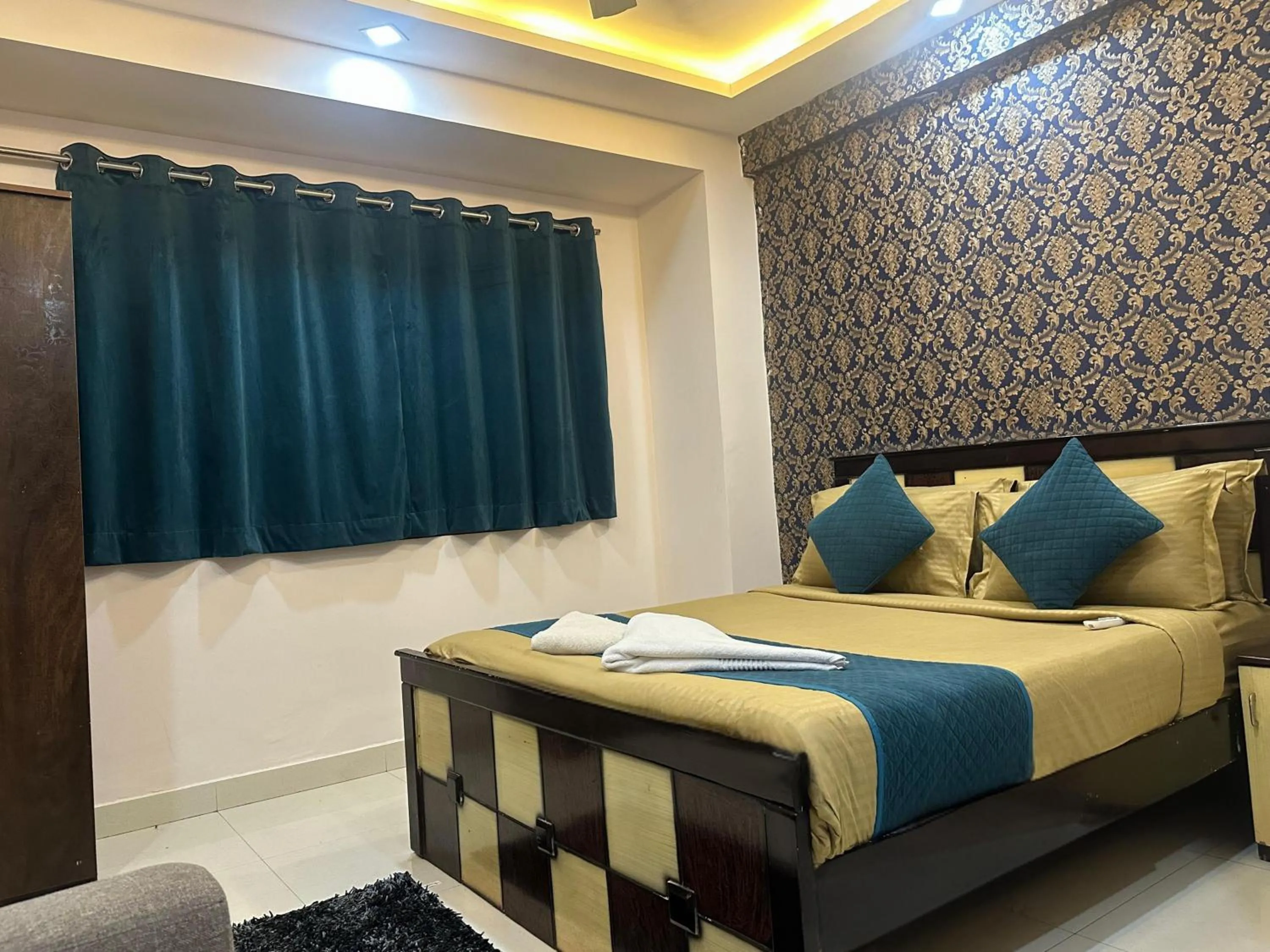 Photo of the whole room, Bed in Blue Bliss Suites By PPH Living