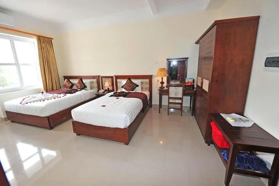 Bed in DUY TAN VINH Hotel