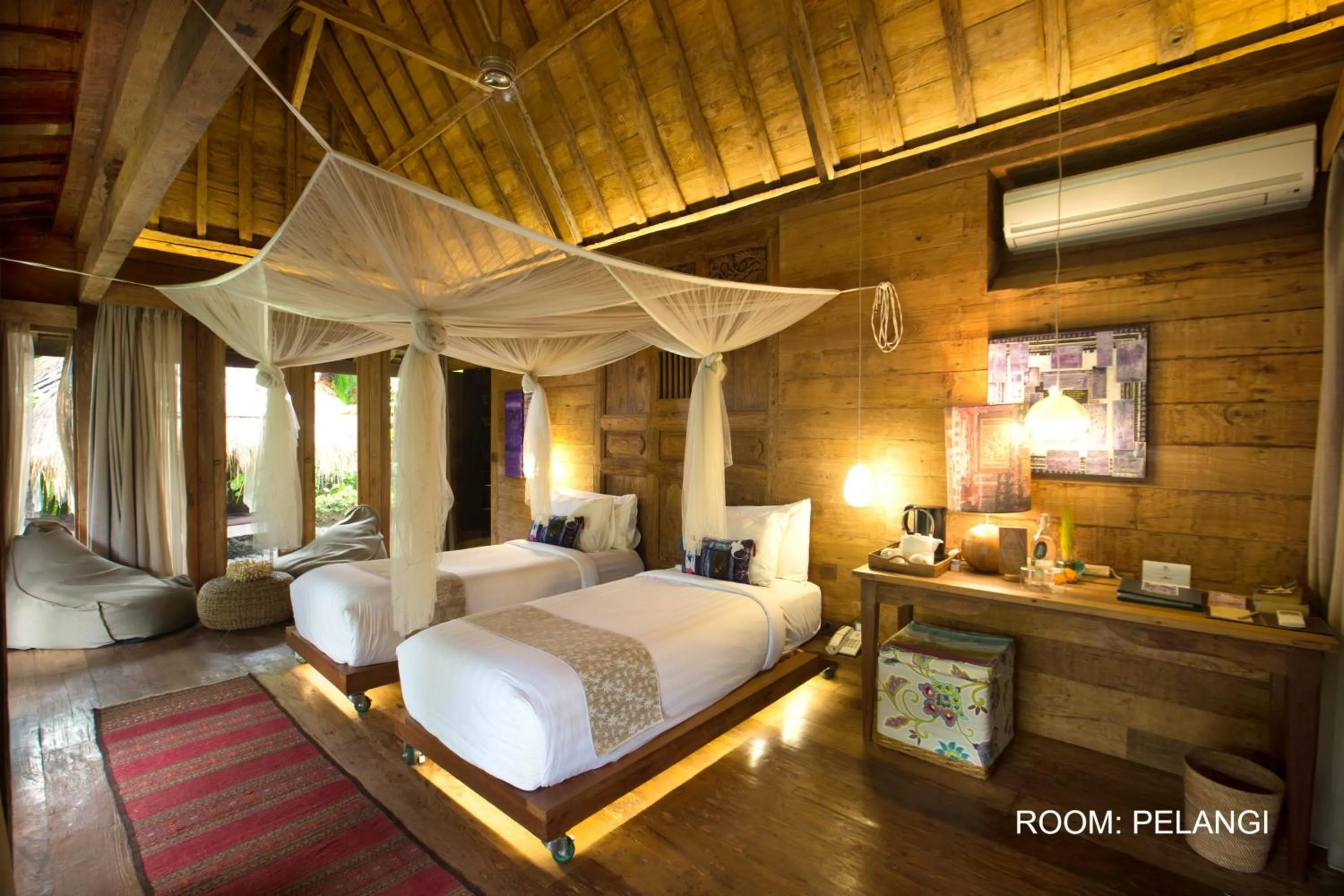 Bed in Blue Karma Dijiwa Ubud