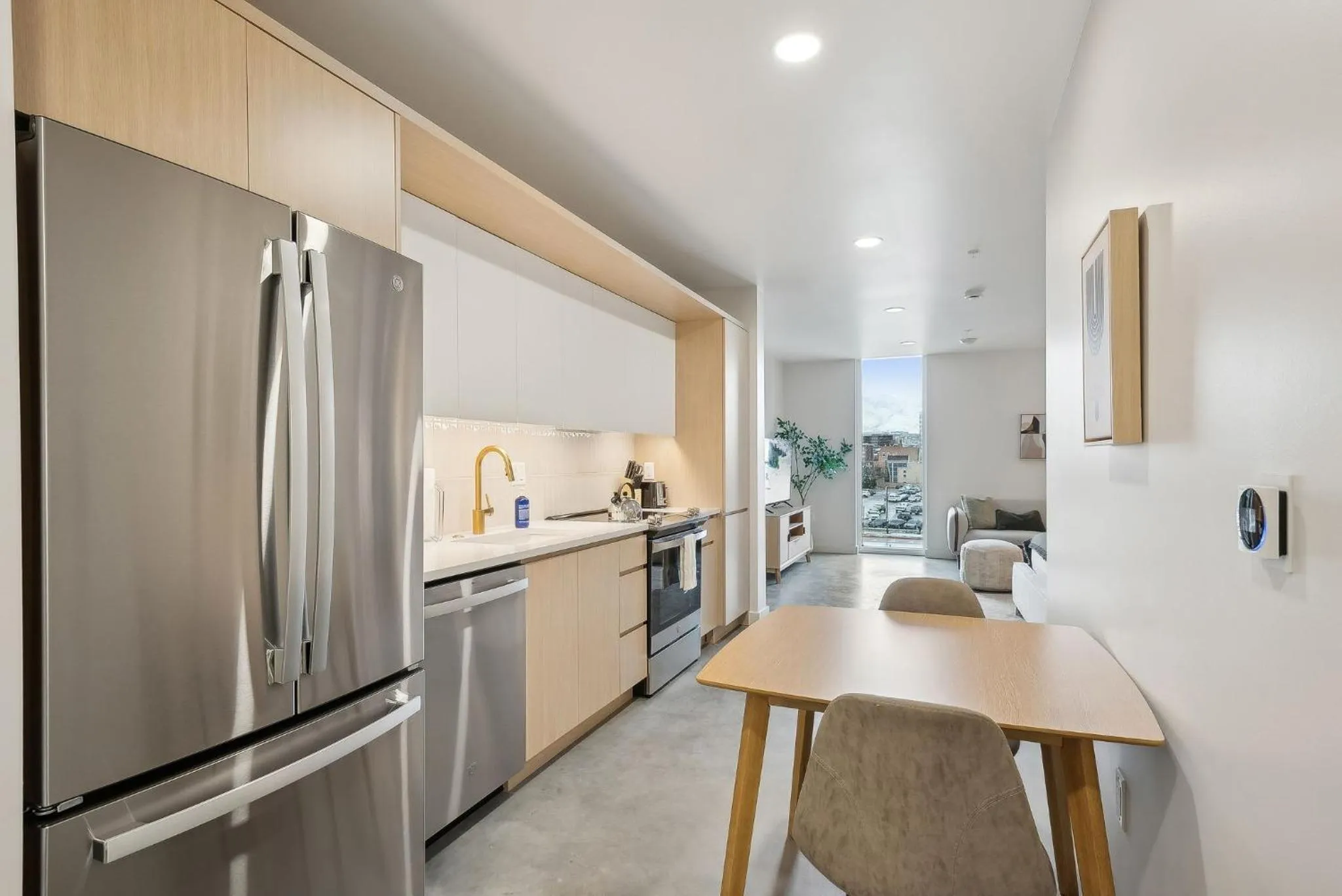 Kitchen or kitchenette in Placemakr Salt Lake City