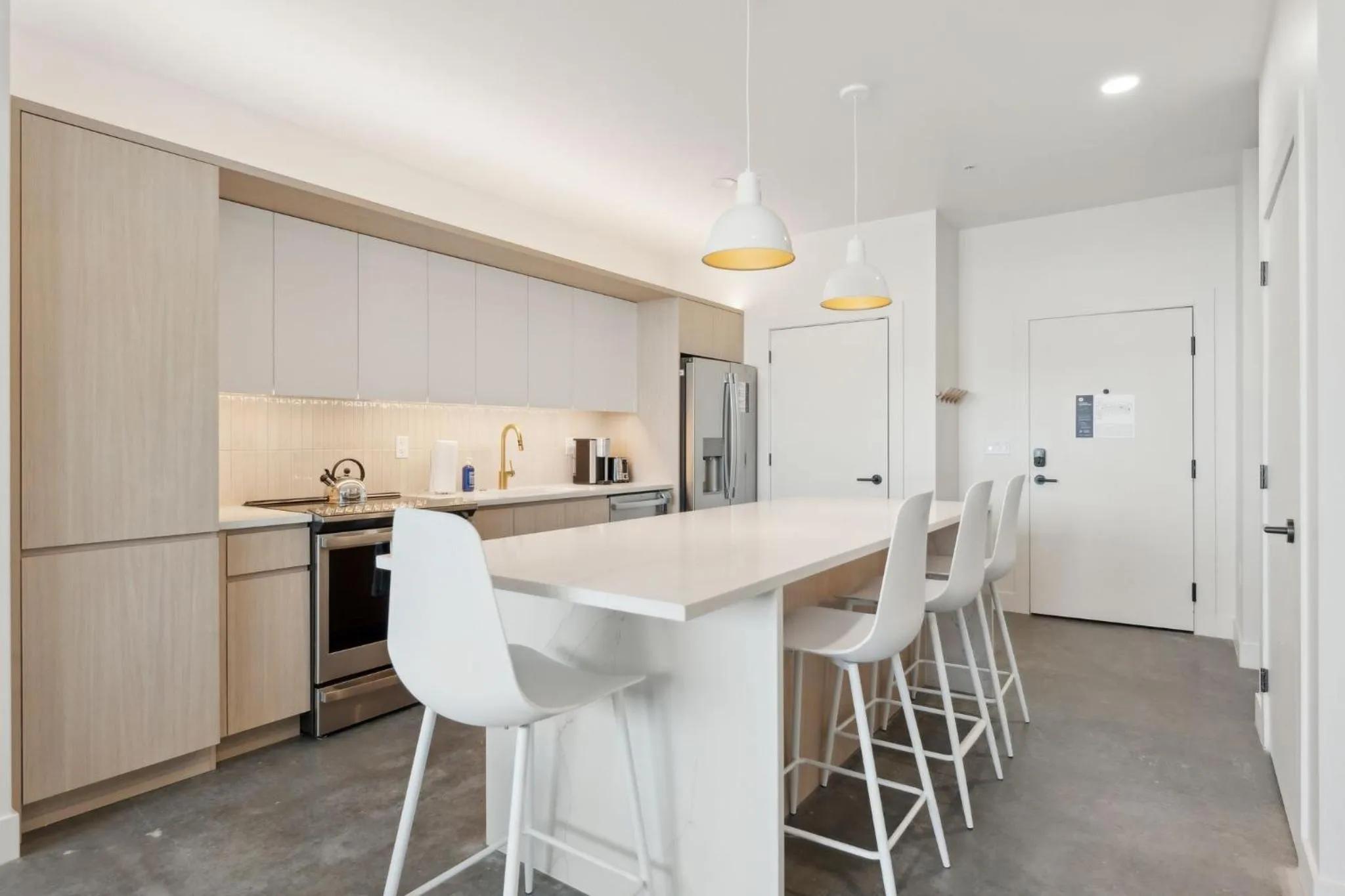 Kitchen or kitchenette in Placemakr Salt Lake City