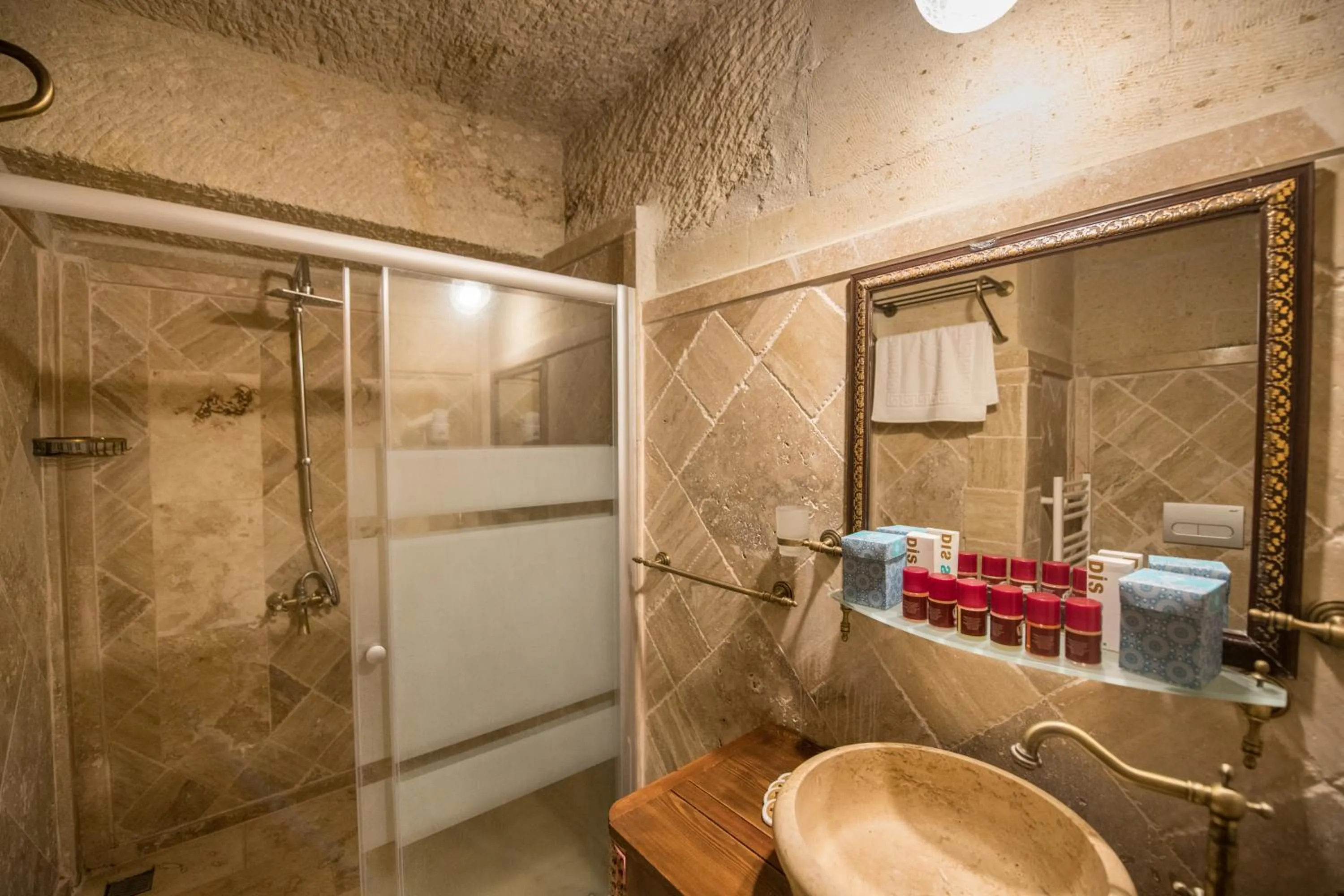 Bathroom in Charming Cave Hotel