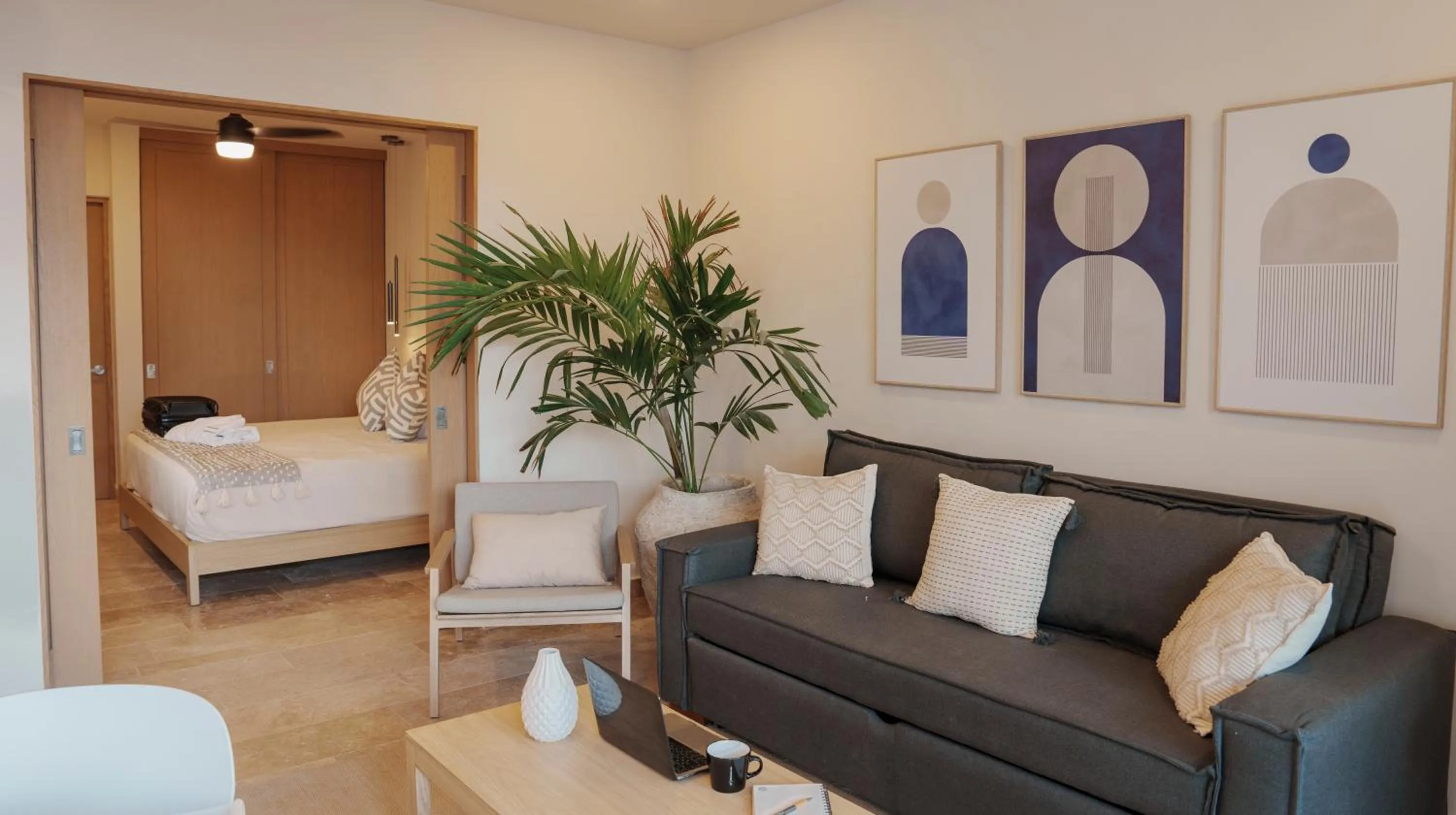 Living room, Bed in abba Suites Playa del Carmen